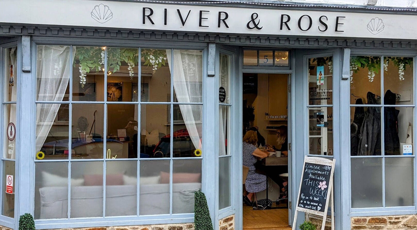Charming facade of River and Rose in Dartmouth, England, showcasing inviting beauty space.