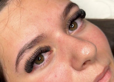 Close-up of eyelash extensions at ACR Cosmetics, Maidstone, England, GB highlighting natural beauty.