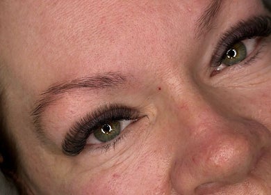 Close-up of eyelash extensions at ACR Cosmetics, Maidstone, England, GB, showcasing detailed lash artistry.