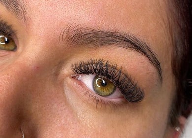 Close-up of eyelash extensions at ACR Cosmetics, Maidstone, England, GB highlighting detailed artistry.