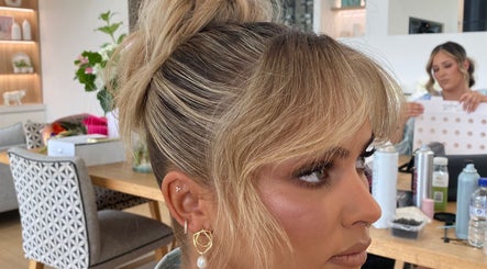 Elegant blonde updo hairstyle at Molly Sarah Hair, Ballarat Central, Victoria, AU, showcasing salon's style.