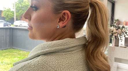 Side profile of elegant ponytail at Molly Sarah Hair, Ballarat Central, Victoria, AU salon.