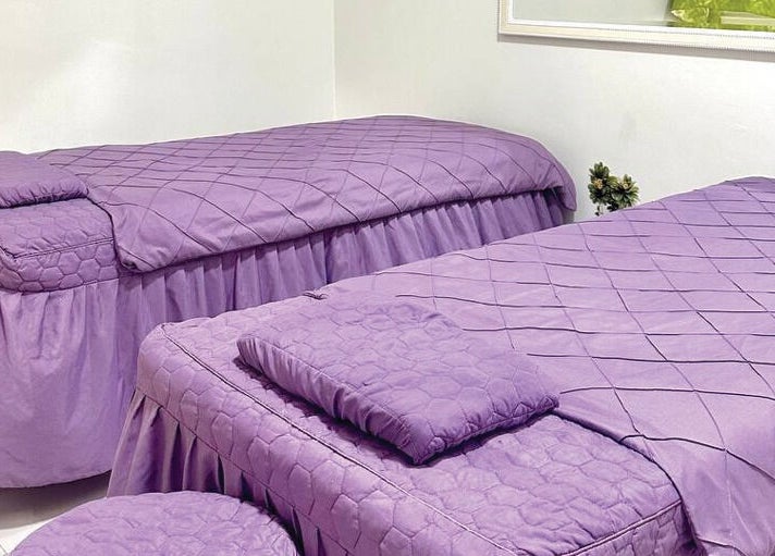 Lavender massage beds at Belaian Emas Spa, Puncak Alam, Selangor, MY offer a peaceful retreat.