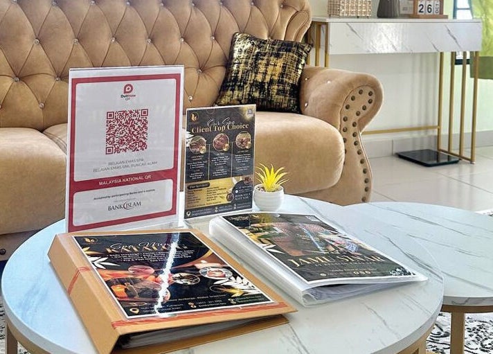 Cozy seating area at Belaian Emas Spa, Puncak Alam, Selangor, MY with elegant decor and brochures.