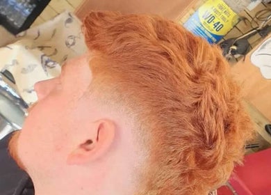 Close-up of ginger hair fade at Bell St. Barbers, North Shields, England, GB showcasing expert barber skills.