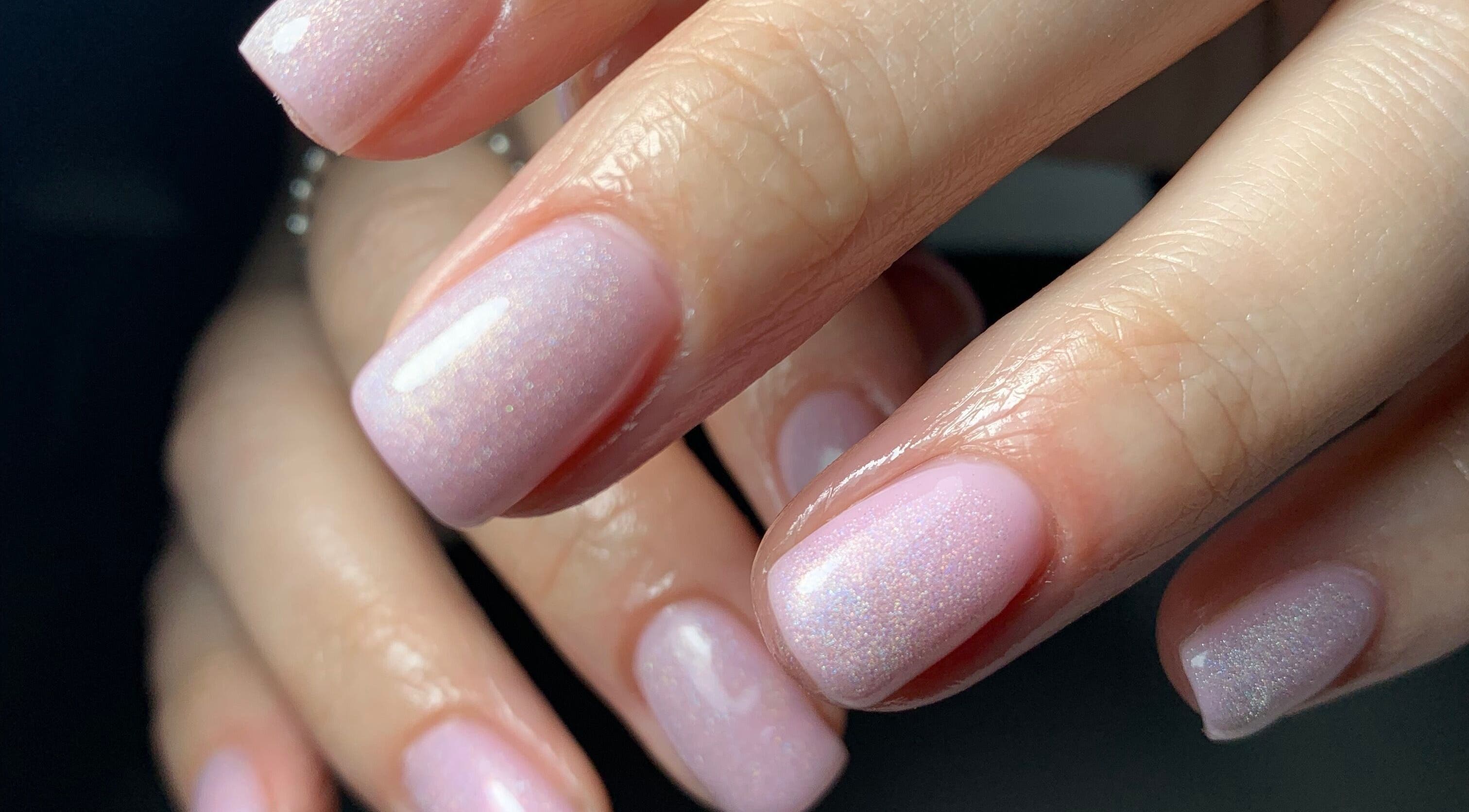 Elegant pink nails at Nailicious by Vanessa, Stockport, GB, showcasing expert manicure skills.