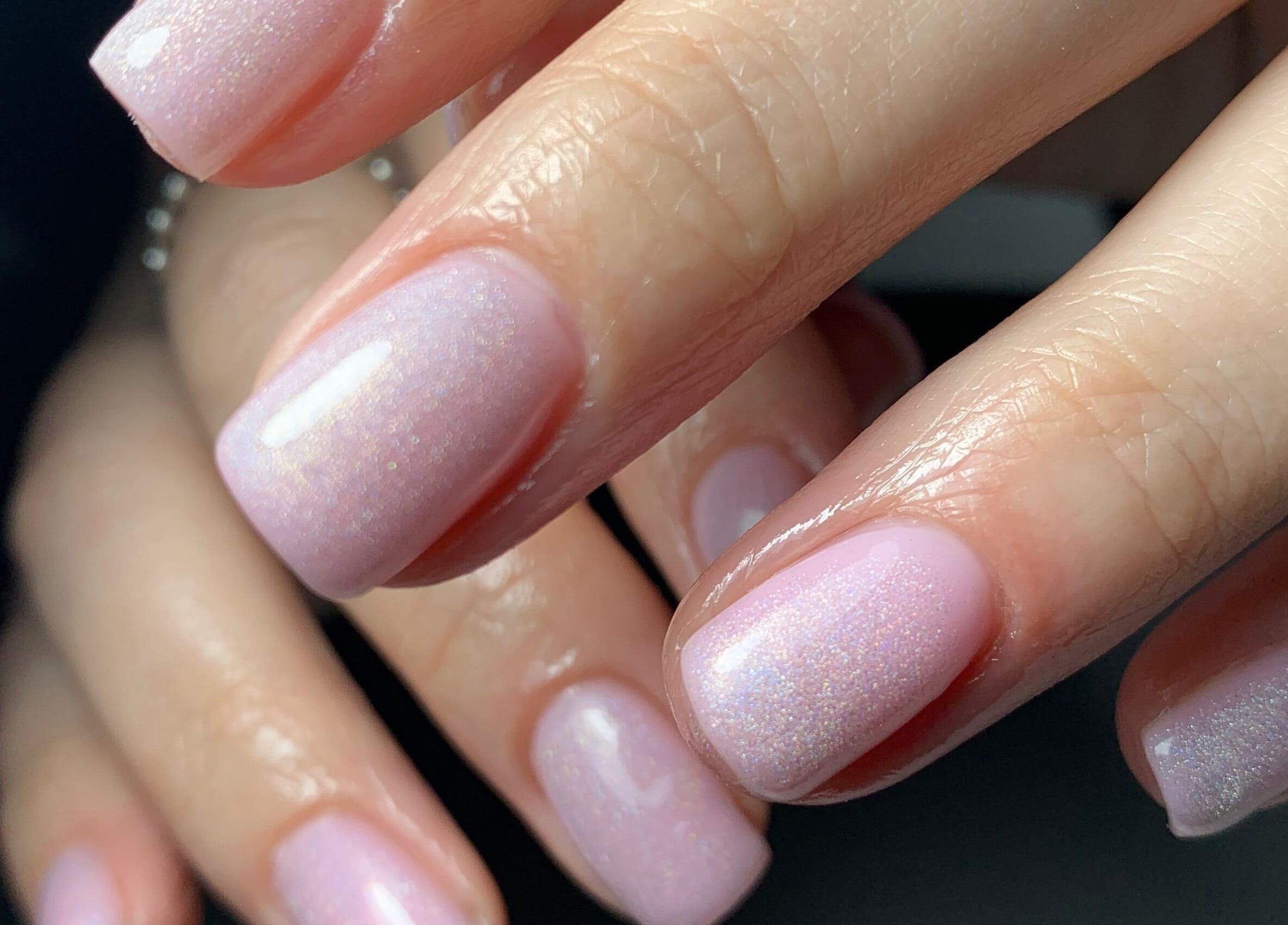 Elegant shimmering pink manicure at Nailicious by Vanessa, Stockport, GB.