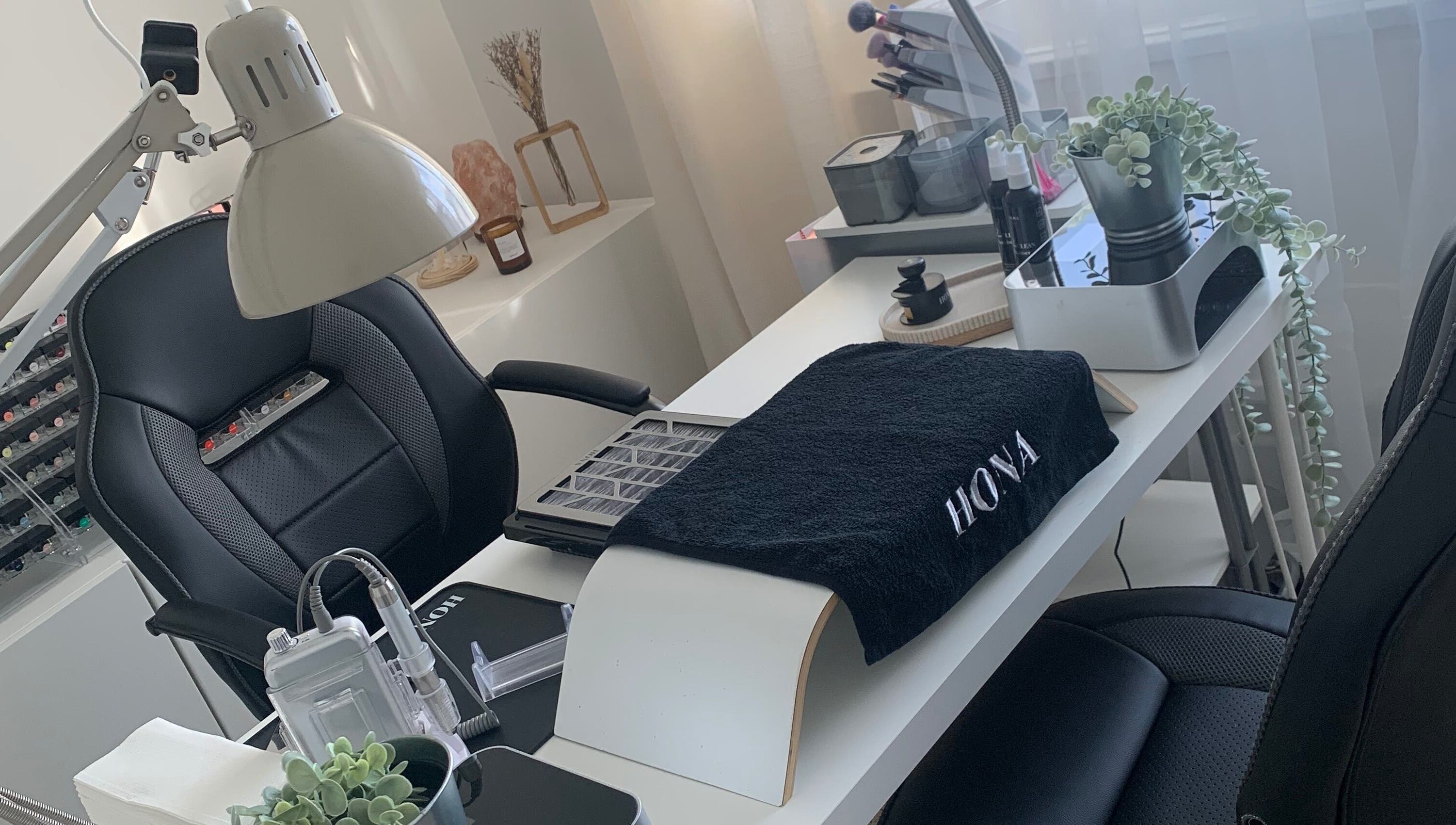 Modern nail station at Nailicious by Vanessa, Stockport, GB featuring sleek decor and comfortable seating.