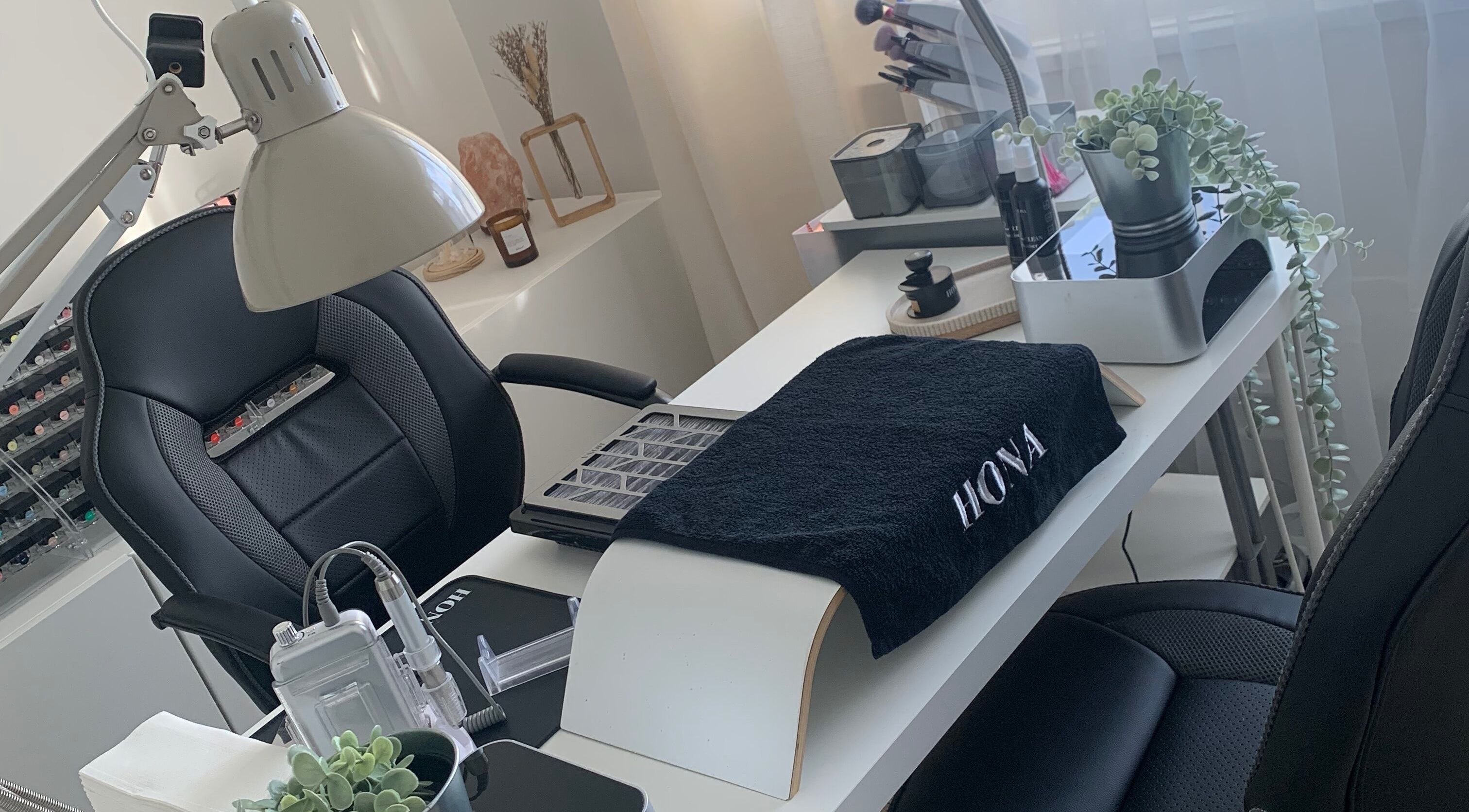 Modern, chic nail station at Nailicious by Vanessa in Stockport, GB, with sleek decor and comfortable seating.