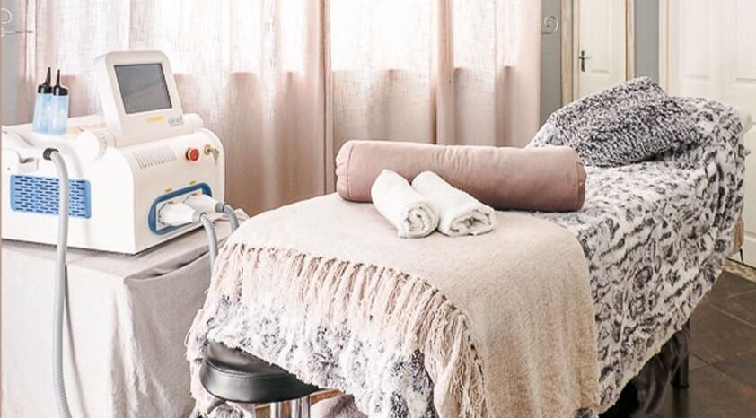 Luxurious treatment room at Salon on Nutans in Cape Town, Western Cape, ZA with spa bed and equipment.