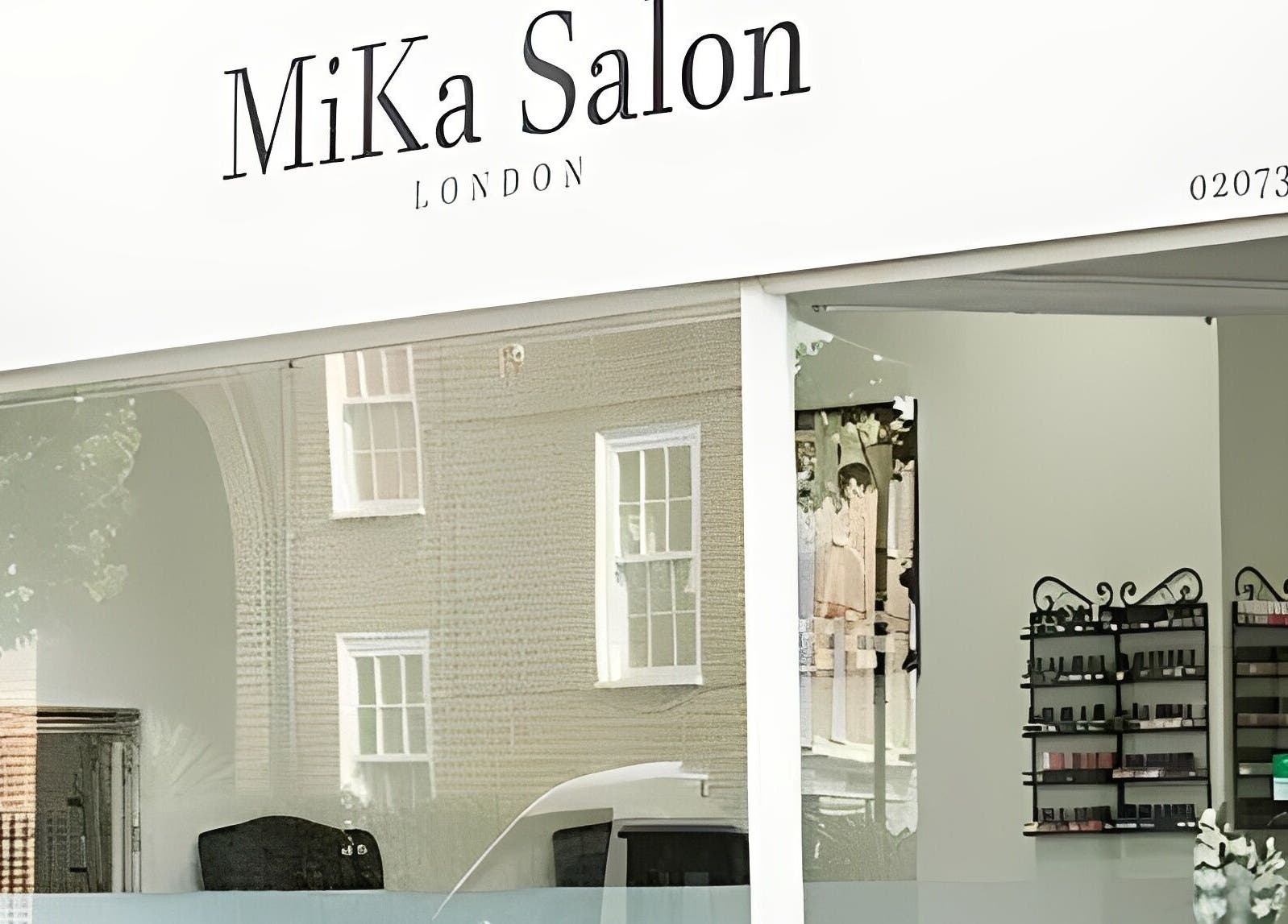 Entrance of MiKa Salon with elegant signage in London, England, GB, showcasing wellness and beauty services.