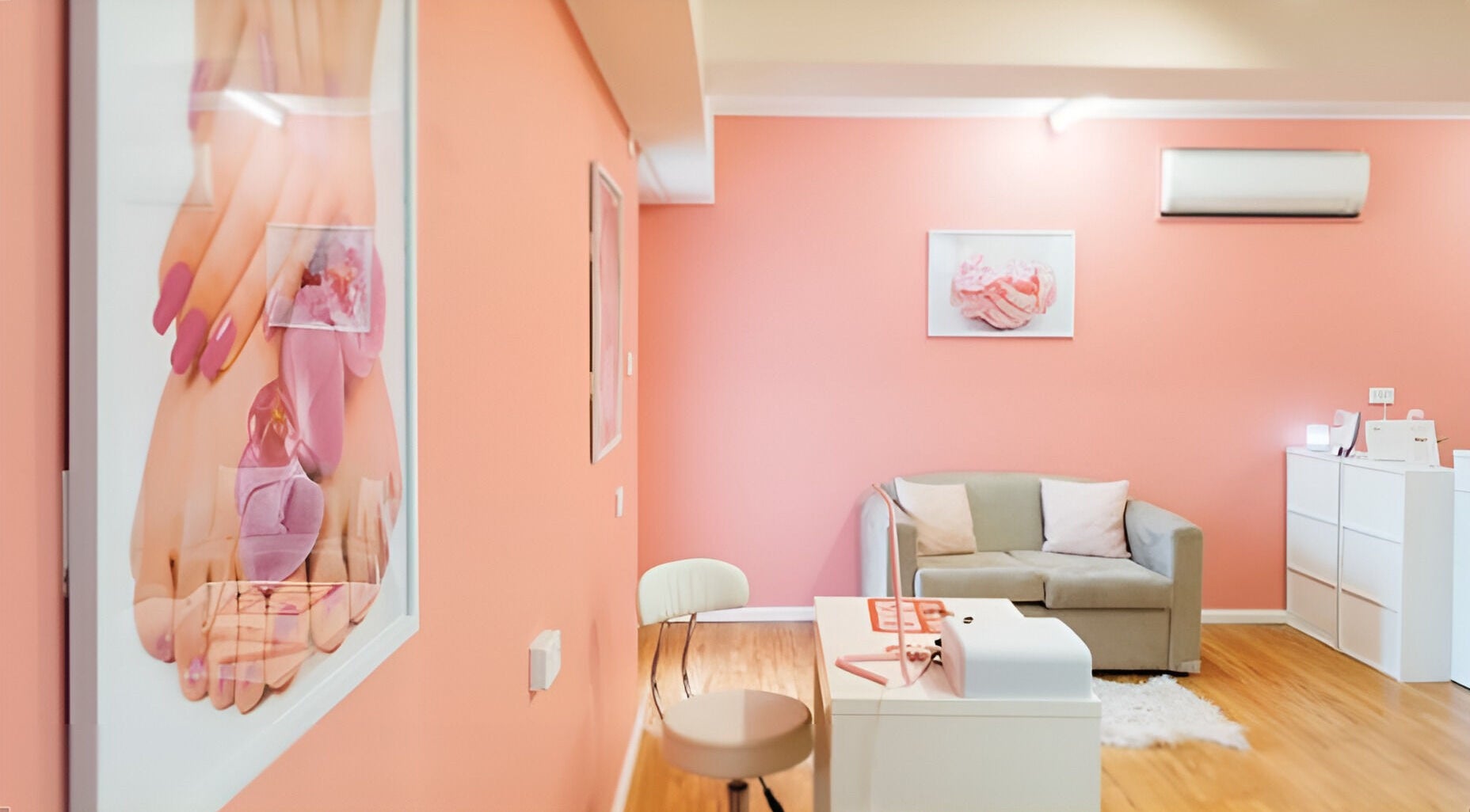 Inviting interior of Glitzy Glam Beauty Salon, Holland Park West, Queensland, AU, with peach walls and cozy seating.