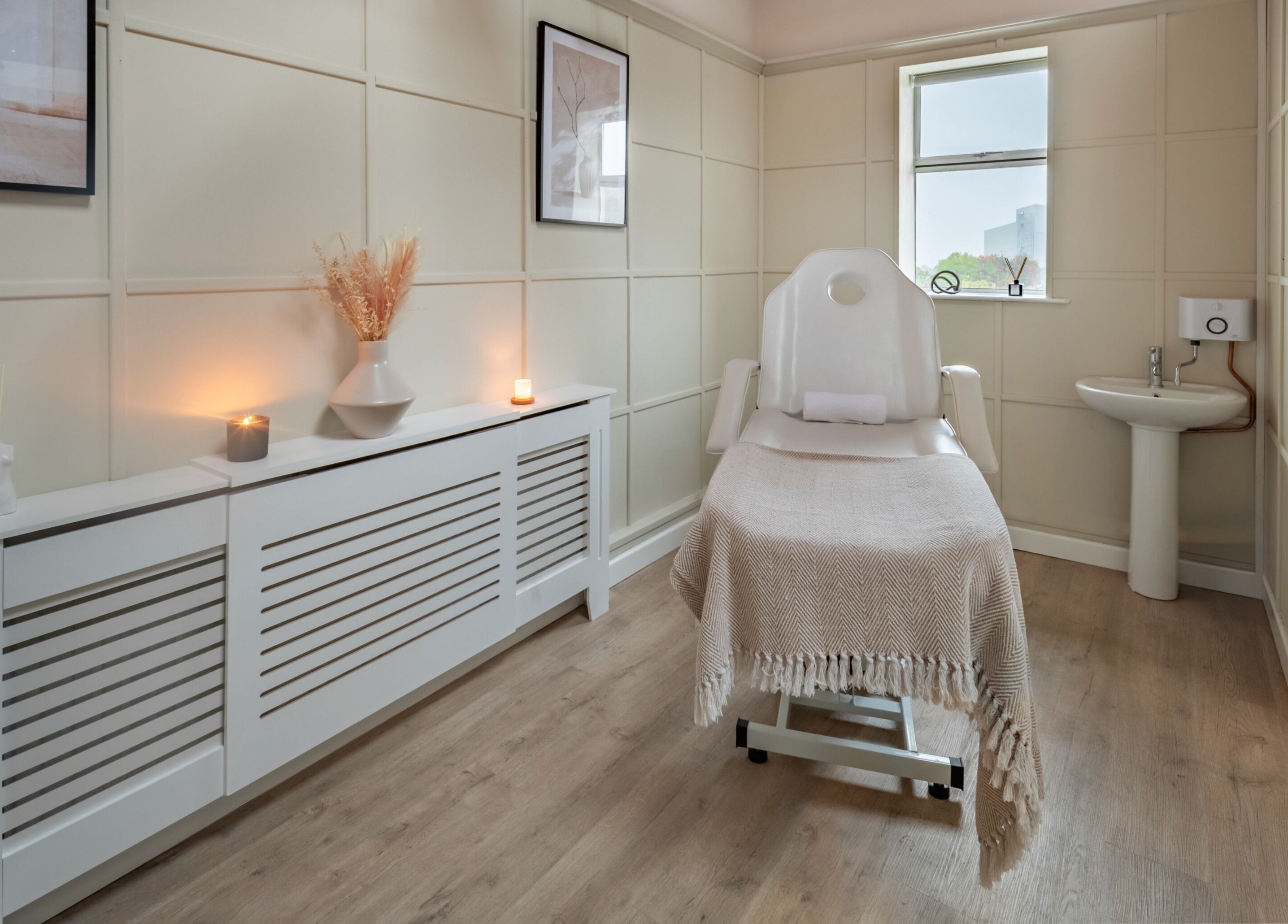 Tranquil treatment room at Bree Spivey Cosmetics, Exeter, England, GB with relaxing ambiance and elegant decor.