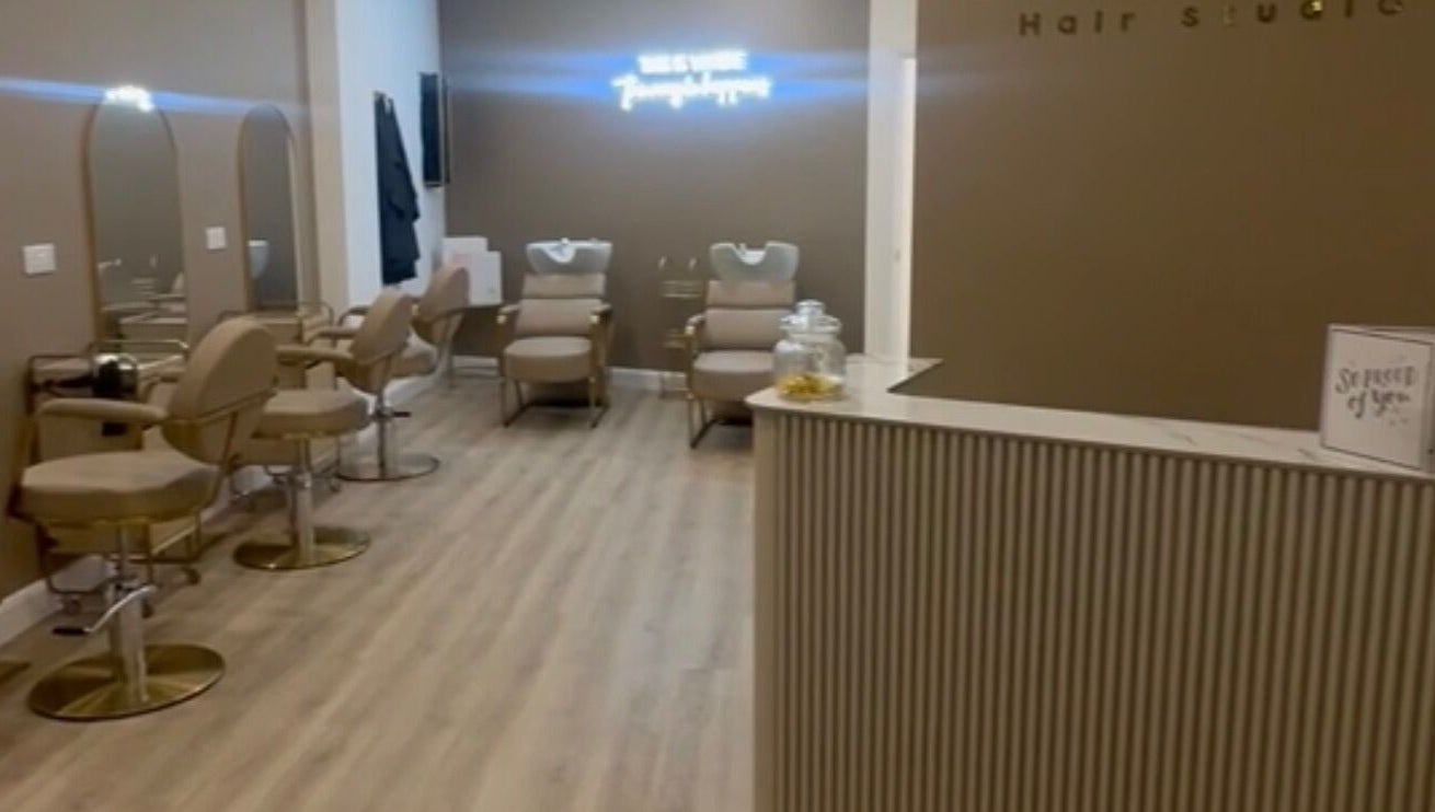 Modern salon interior at Ellie at Cloud & Co, Hinckley, England, GB with stylish decor and seating.
