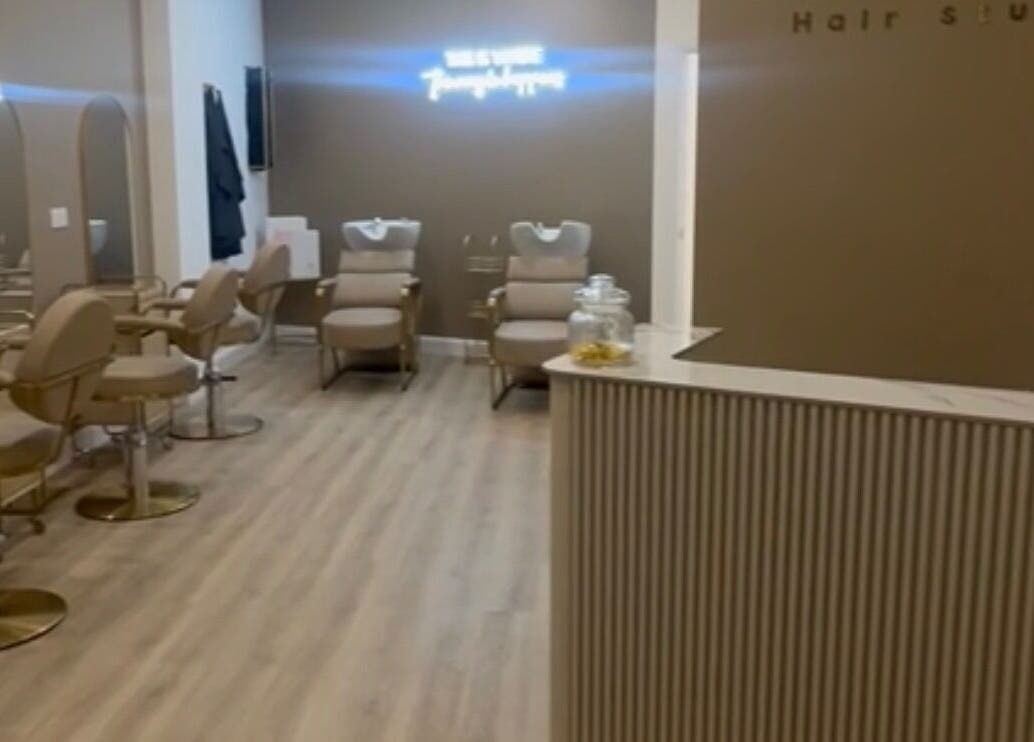 Modern salon interior at Ellie at Cloud & Co, Hinckley, England, GB with stylish decor and seating.