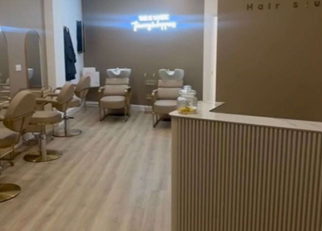 Modern salon interior at Ellie at Cloud & Co, Hinckley, England, GB with stylish decor and seating.