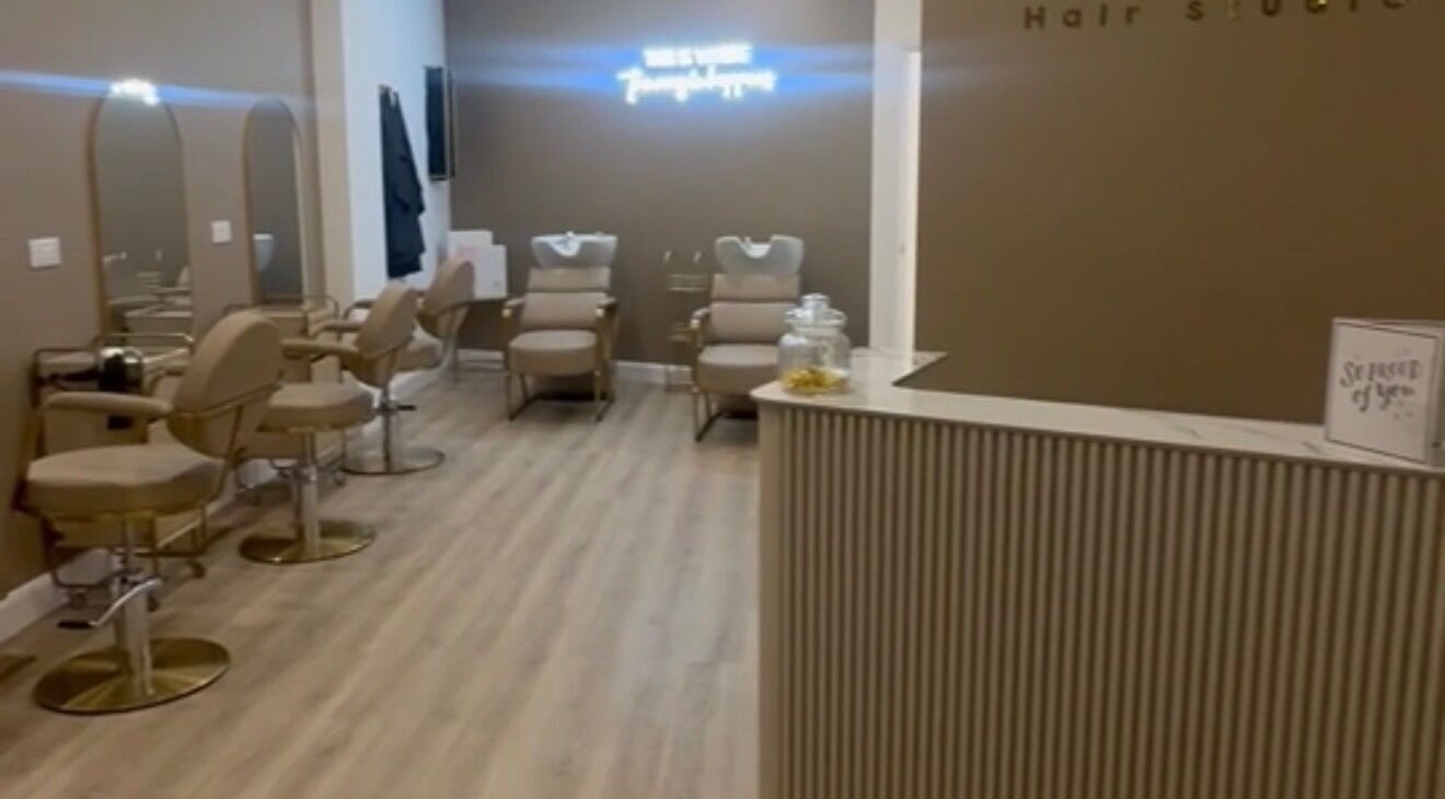Modern salon interior at Ellie at Cloud & Co, Hinckley, England, GB with stylish decor and seating.