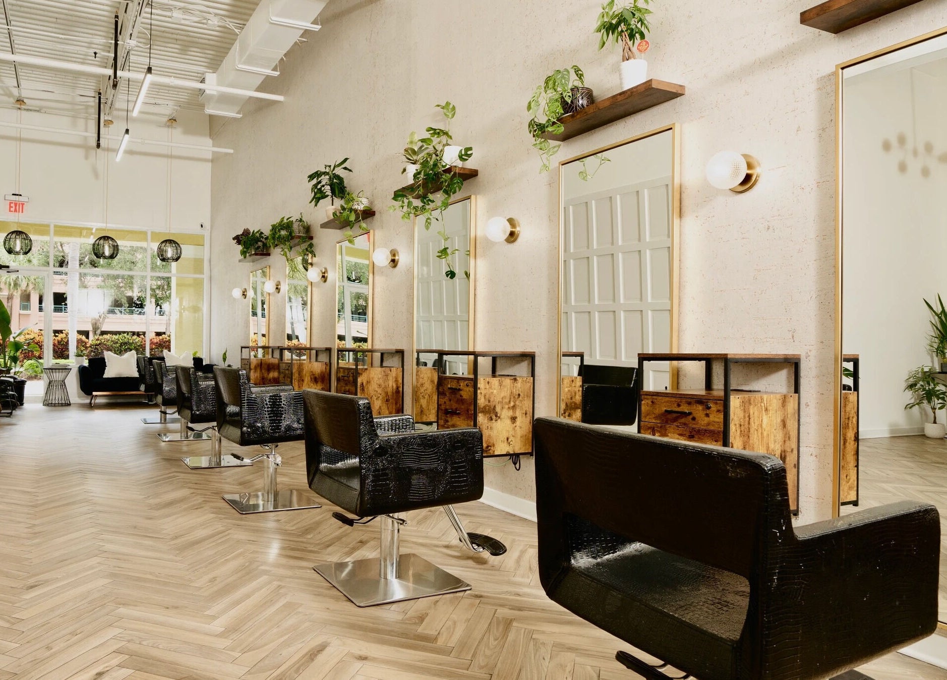 Elegant salon interior at Color by Gia x Vion Boutique Salon in Boca Raton, Florida, US with stylish decor.