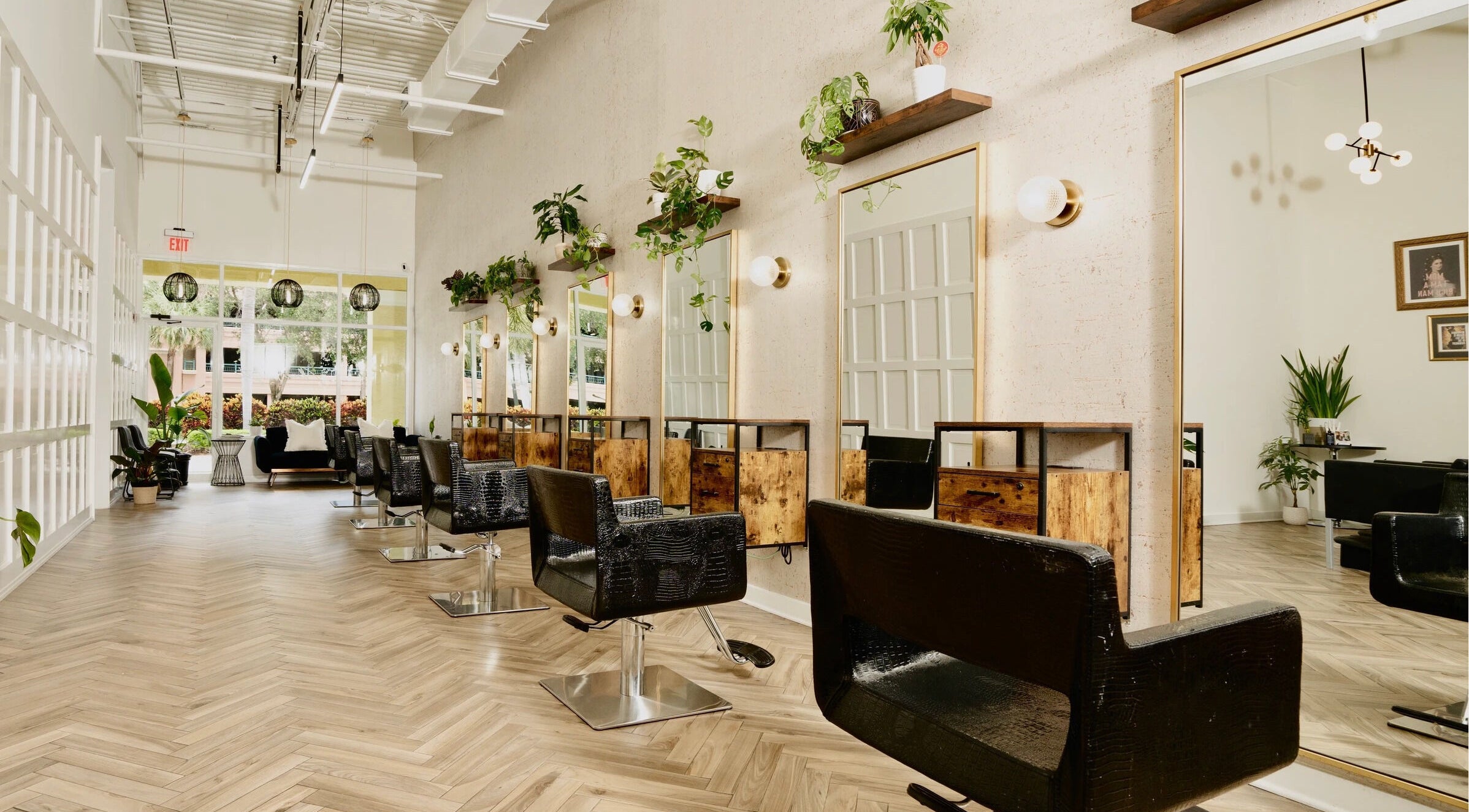 Elegant salon interior at Color by Gia x Vion Boutique Salon in Boca Raton, Florida, US with stylish decor.
