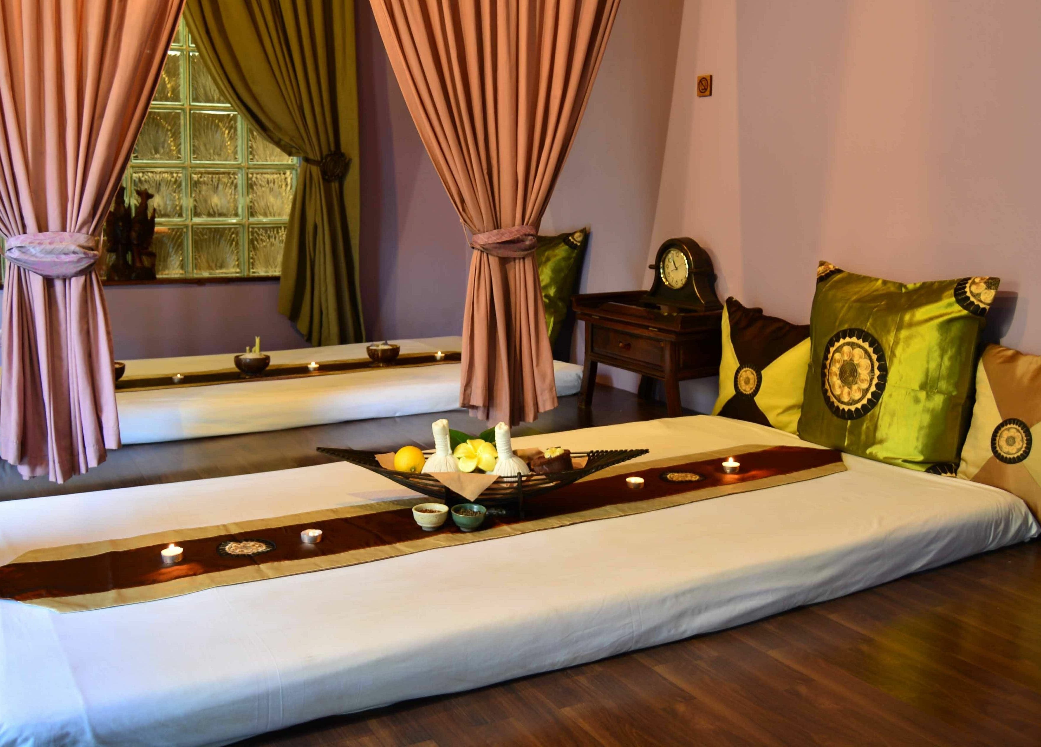 Relaxation area at Sweet Face Thai Health Centre in Pretoria, Gauteng, ZA, featuring serene decor and ambient lighting.