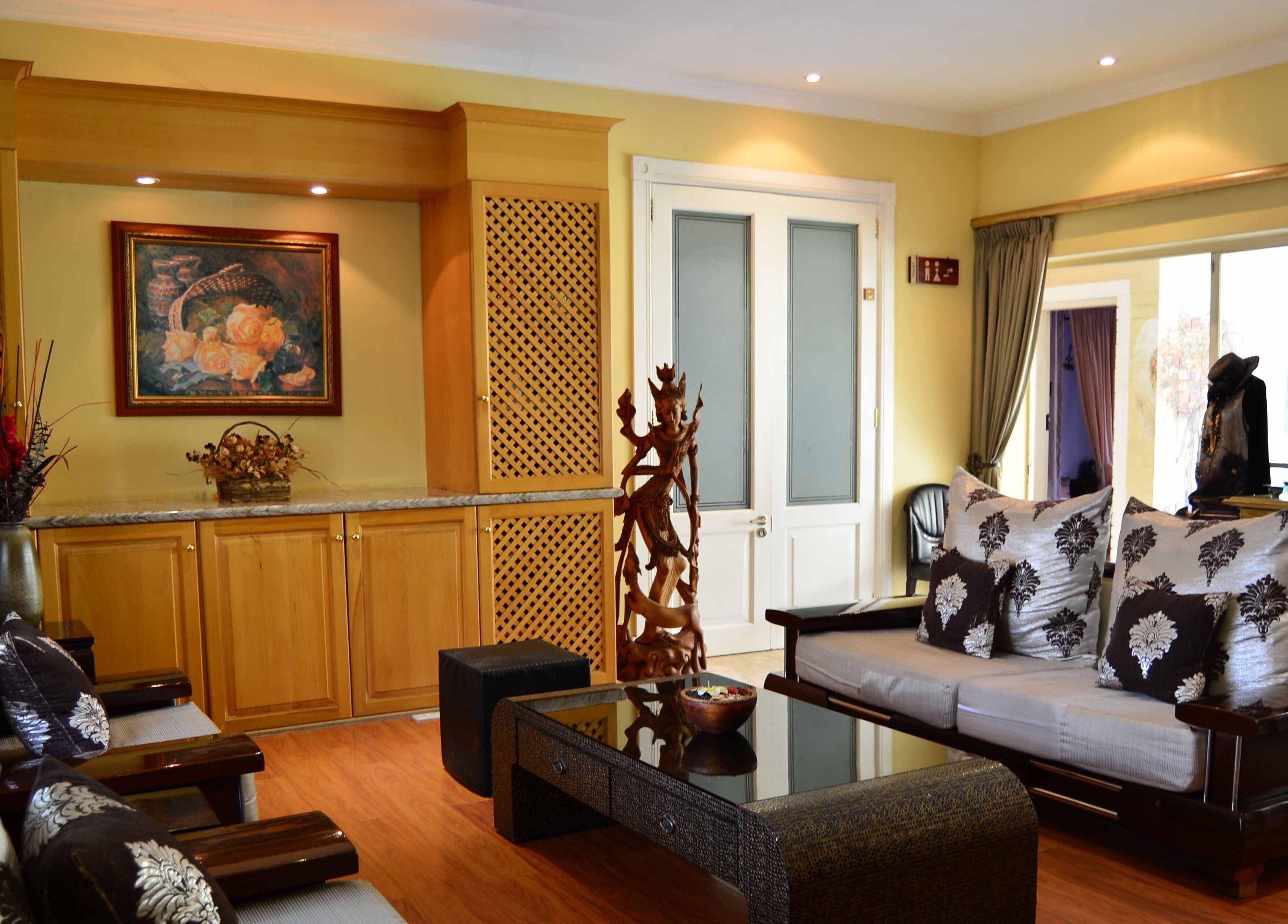 Elegant lounge area at Sweet Face Thai Health Spa, Pretoria, Gauteng, ZA, with stylish decor and soft lighting.
