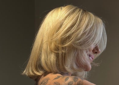 Blonde hairstyle showcasing layers at Hair at Mollys, Cardiff, Wales, GB.