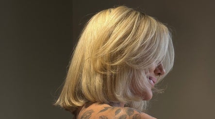Blonde hairstyle showcasing layers at Hair at Mollys, Cardiff, Wales, GB.