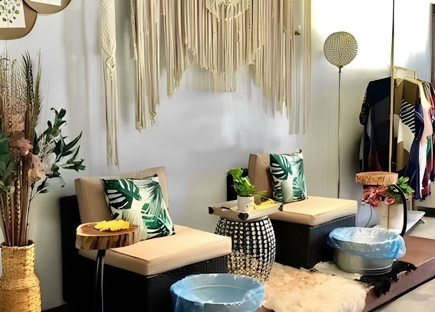 Stylish seating area at Sophisticated Lash & Nail Spa in West Palm Beach, Florida, US with boho decor.