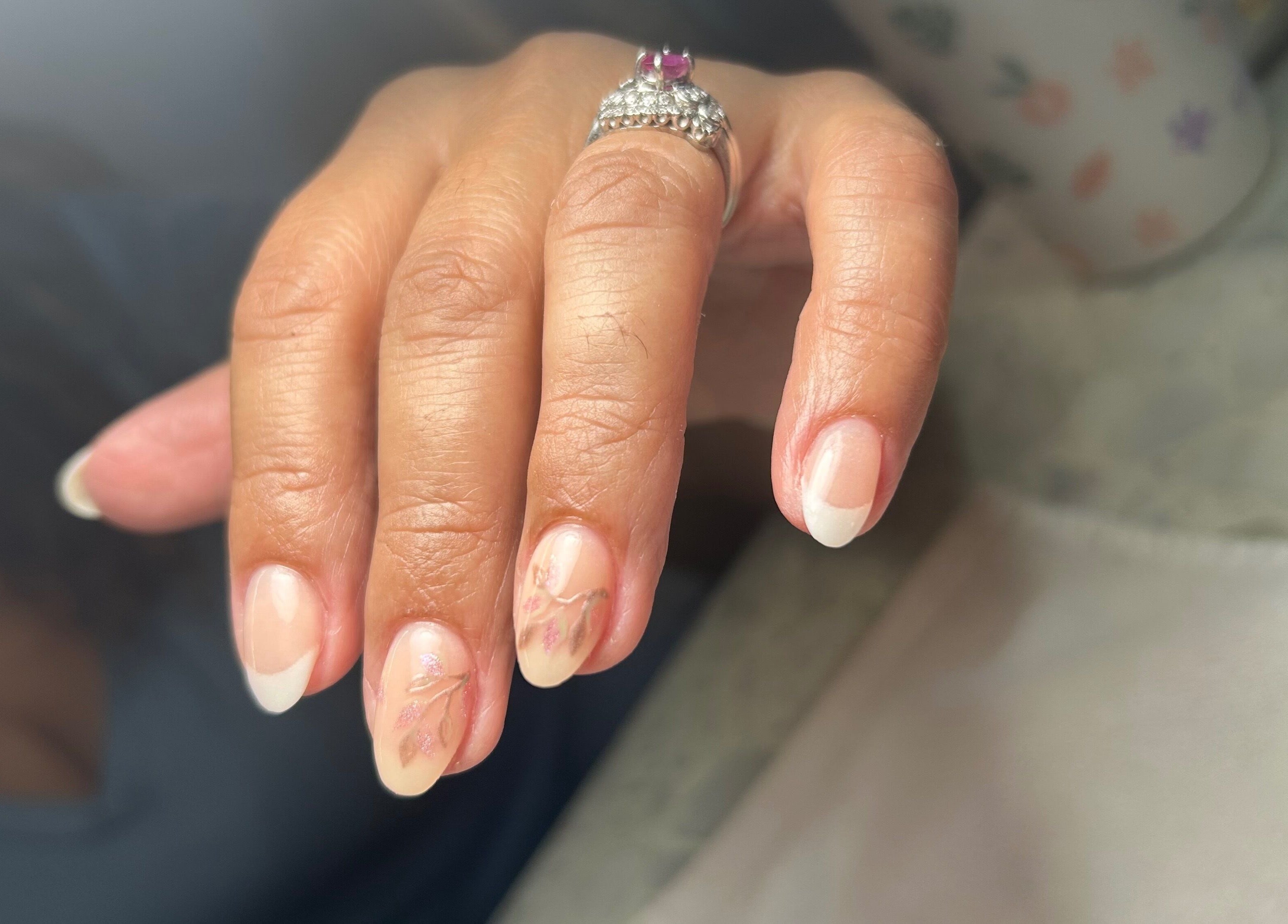 Elegant nail design with flowers at Sophisticated Lash & Nail Spa, West Palm Beach, Florida, US.