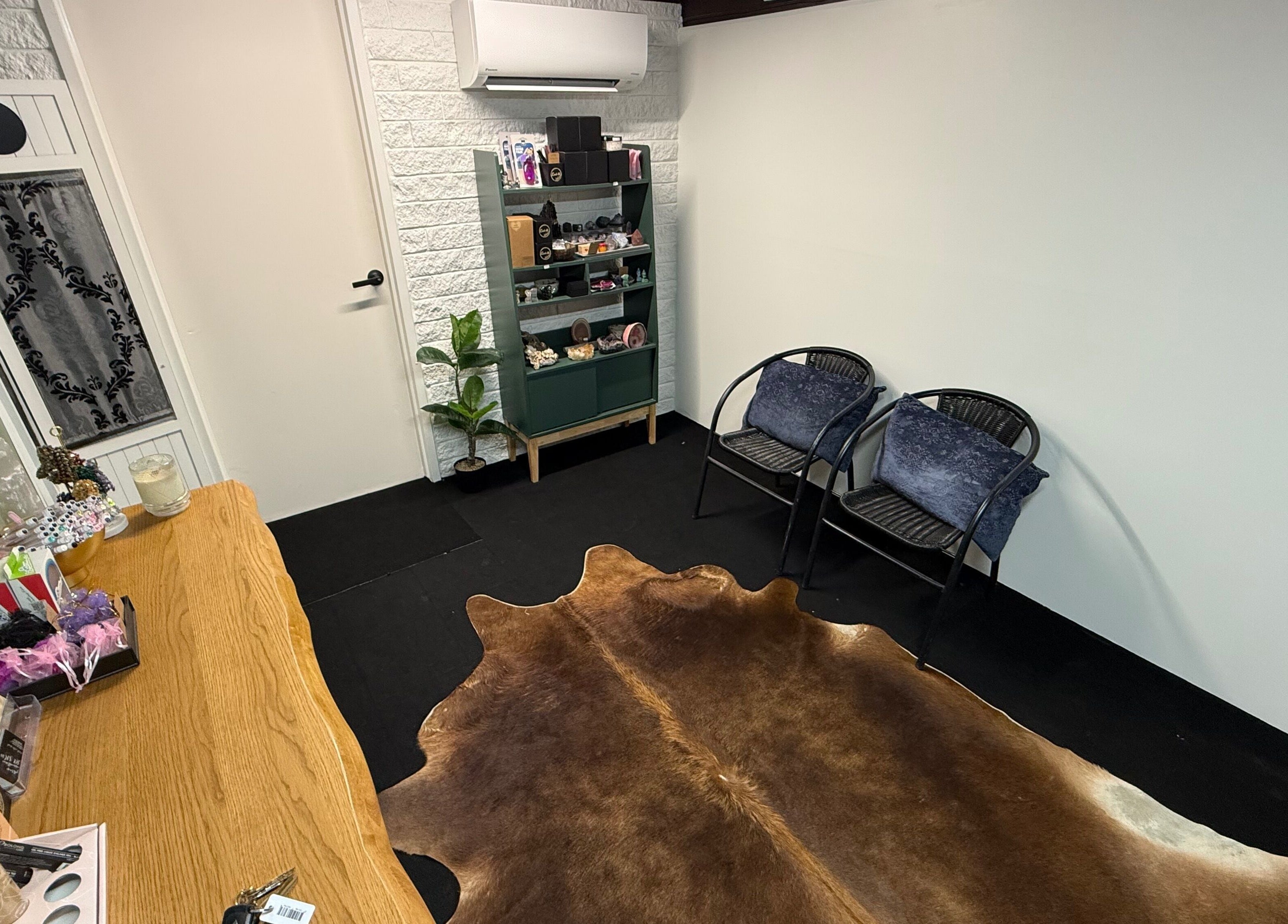 LASH88 in Townsville, Queensland, AU showcases a cozy waiting area with stylish decor and comfortable seating.