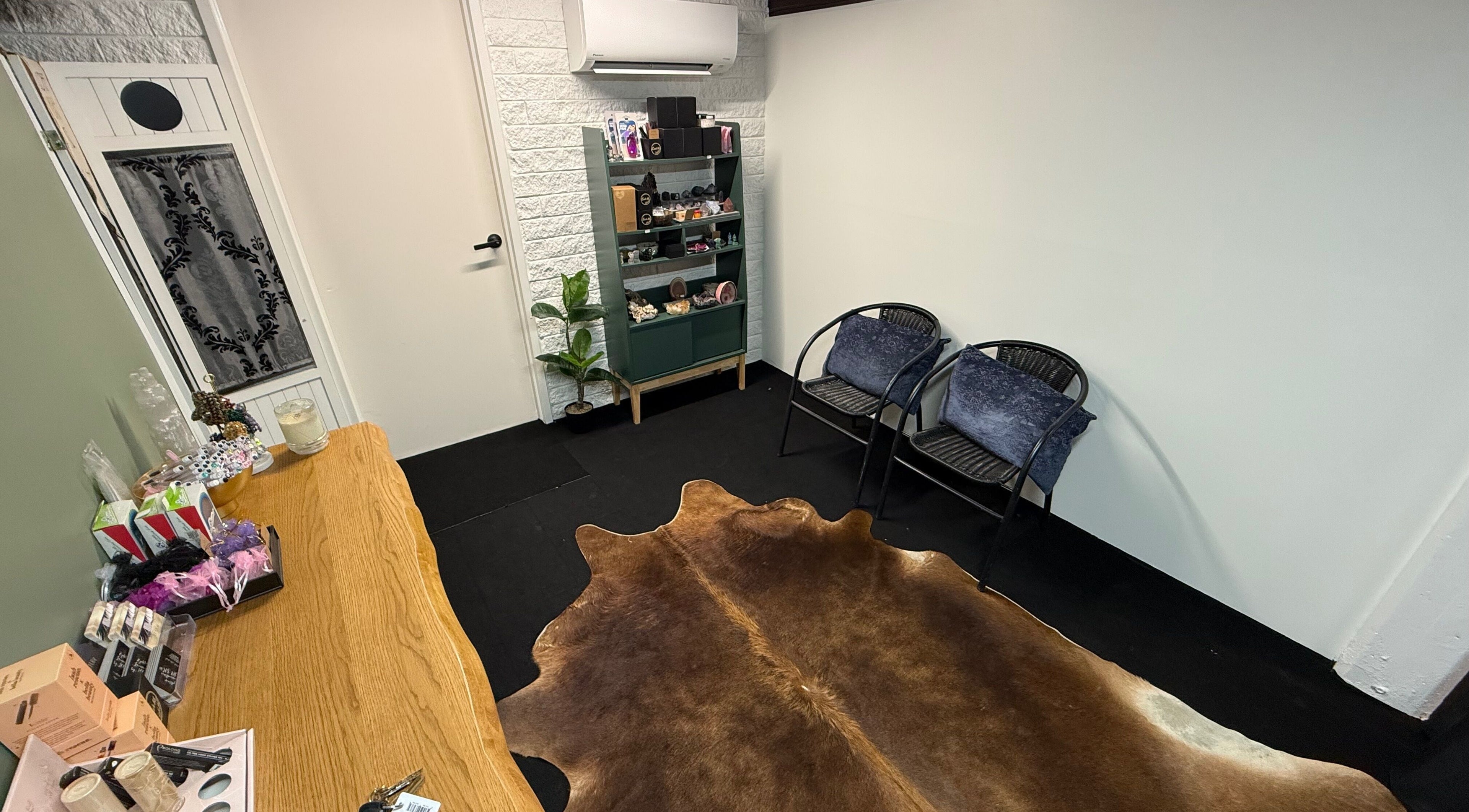 LASH88 in Townsville, Queensland, AU showcases a cozy waiting area with stylish decor and comfortable seating.