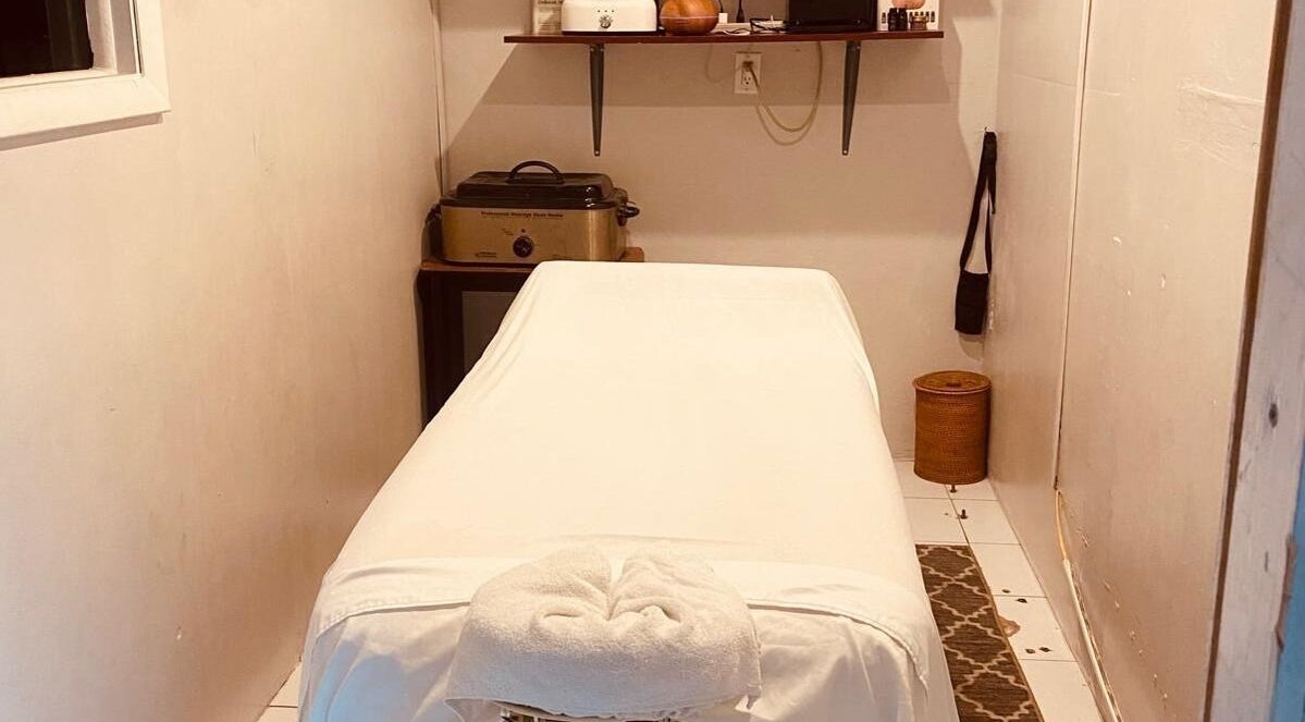 Massage room at The Alpha Male Barbershop, Nassau, New Providence, BS, offering relaxation and comfort.