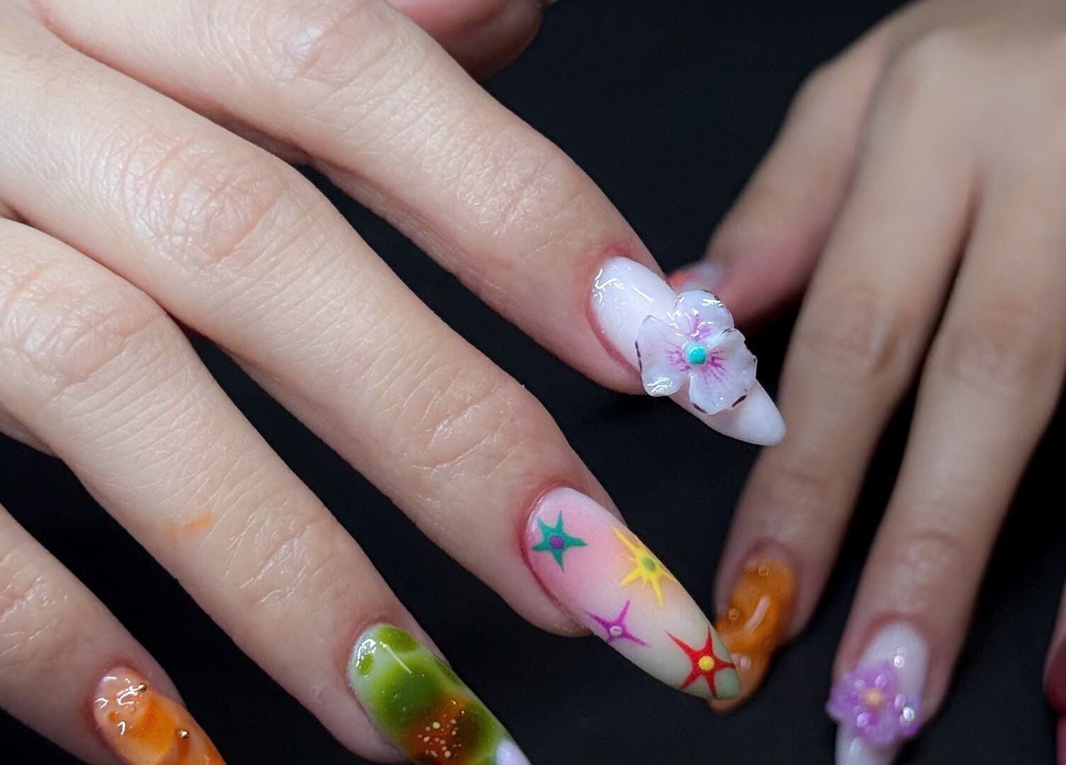 Intricate nail art with floral design at TH Nails and Spa Geelong West, Geelong West, Victoria, AU.