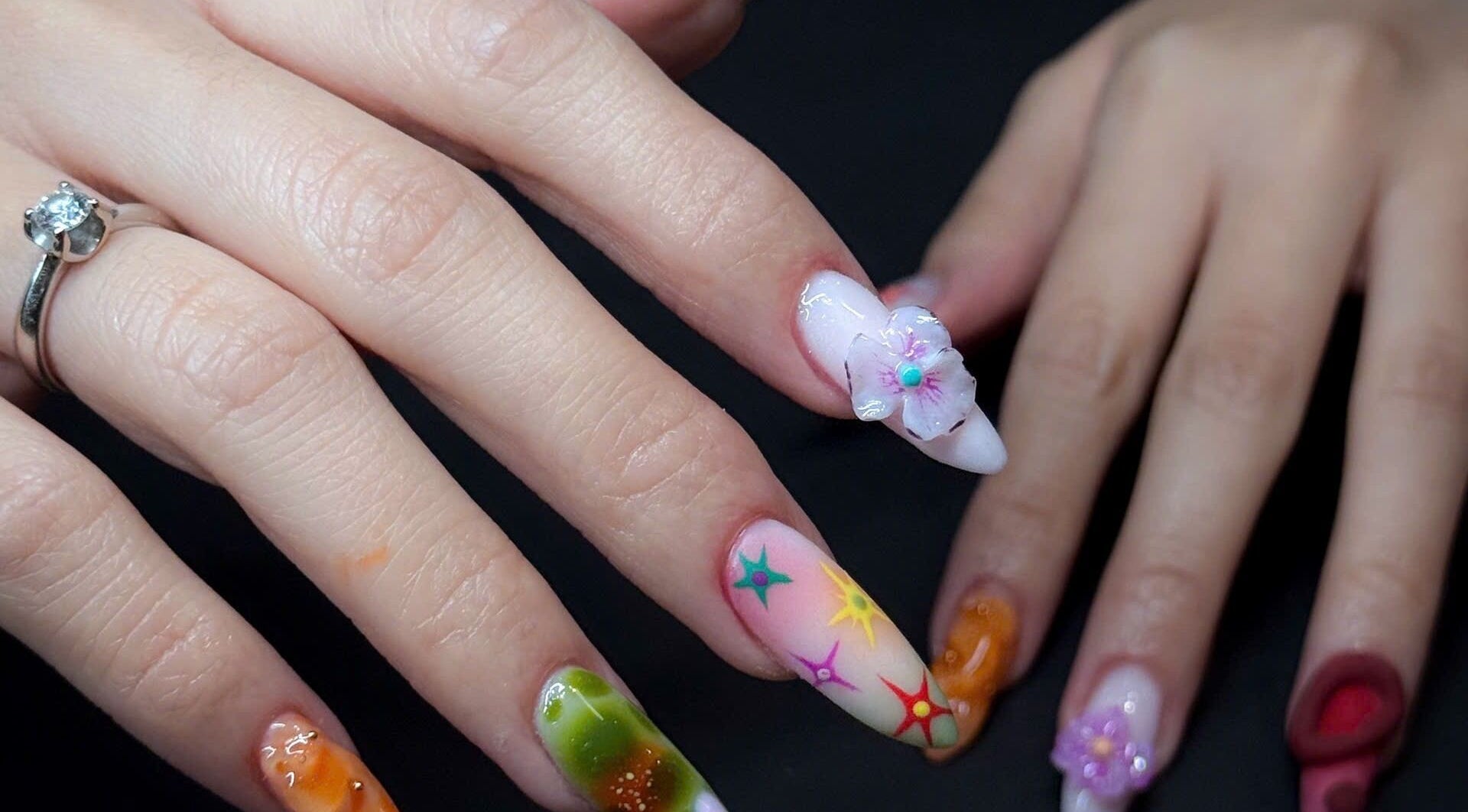 Intricate nail art with floral design at TH Nails and Spa Geelong West, Geelong West, Victoria, AU.