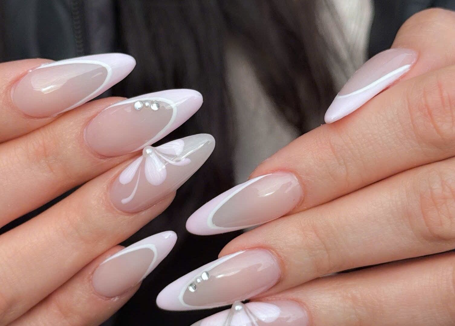 Beautiful pink and white nail art with gems at TH Nails and Spa Geelong West, Geelong West, Victoria, AU.