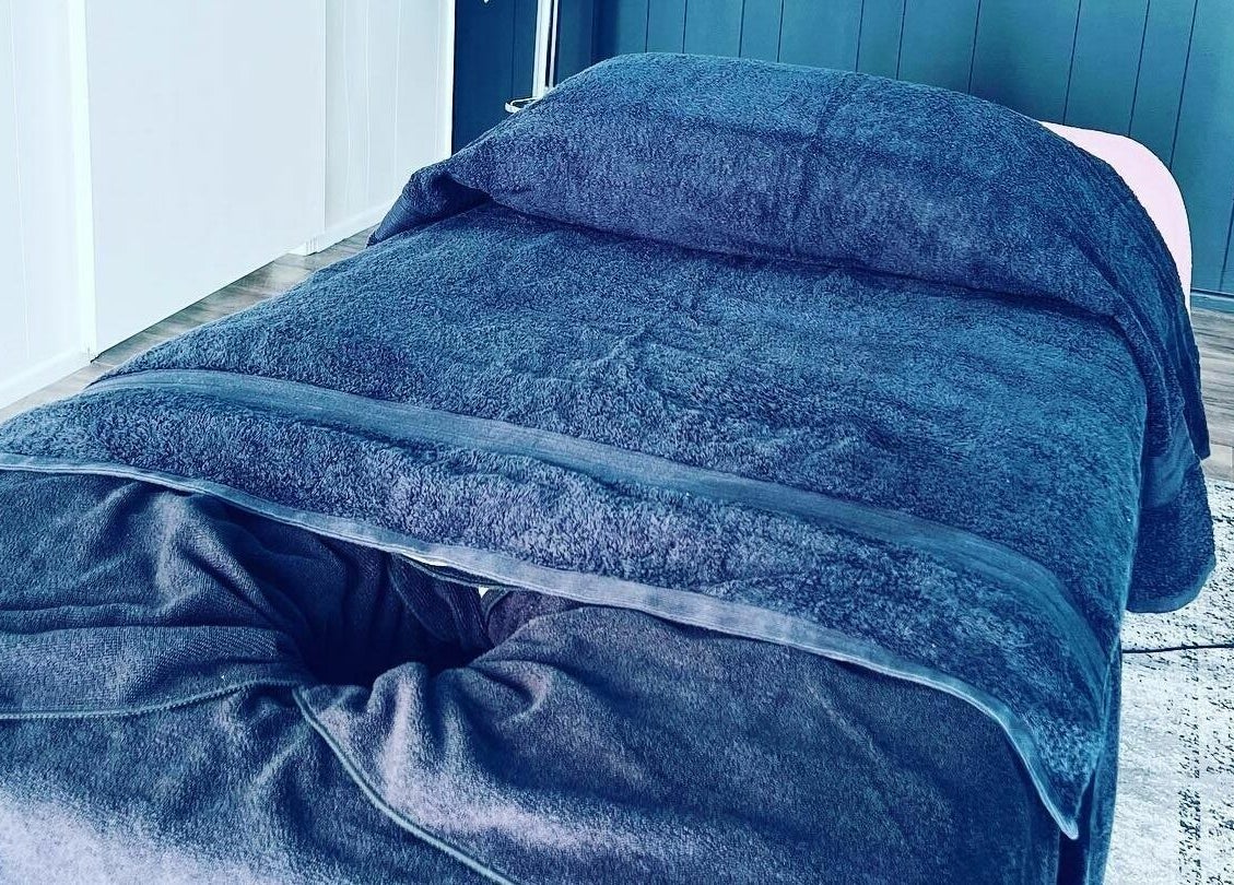 Luxurious treatment bed at Onyx Brows, North Mackay, Queensland, AU, providing ultimate relaxation.