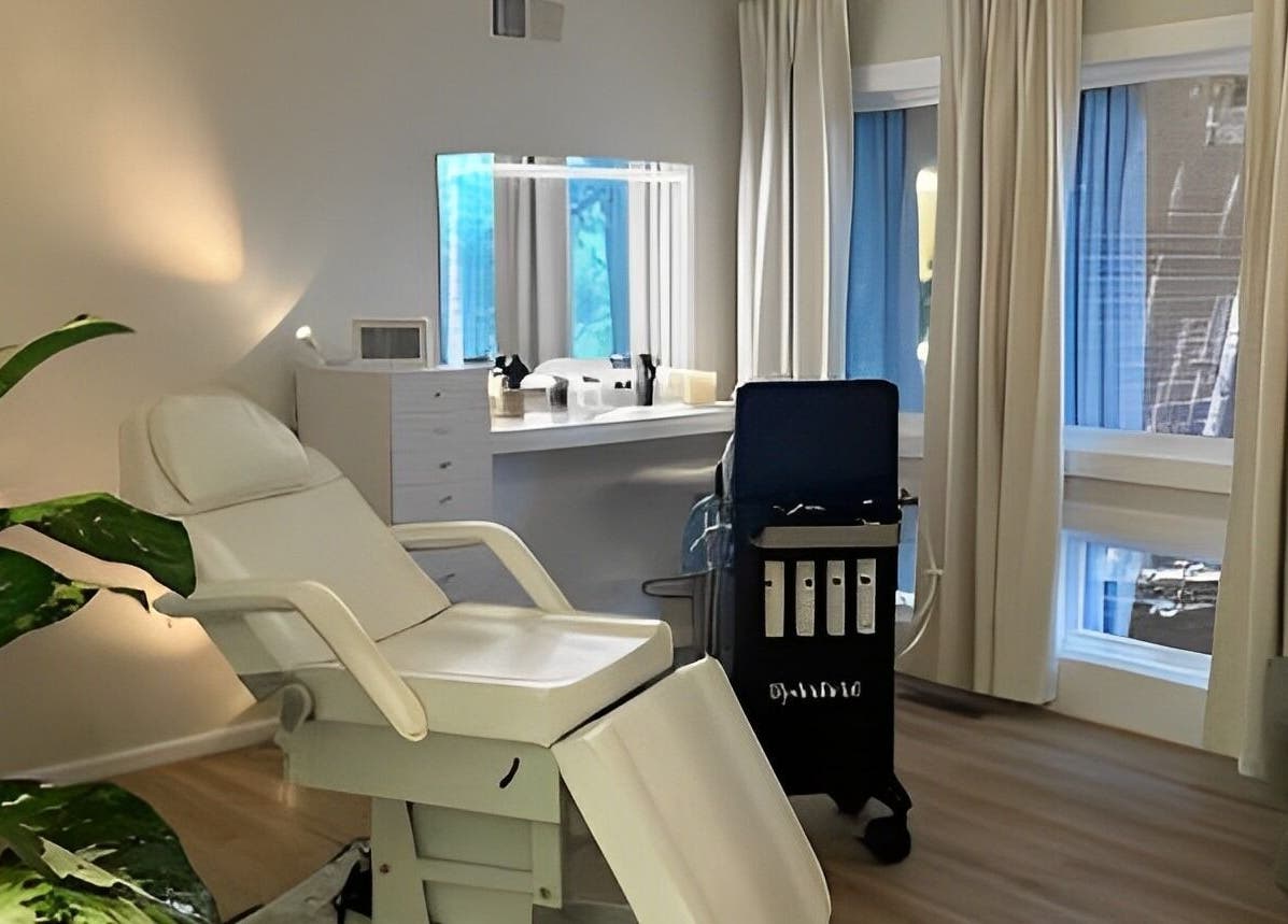 Luxurious treatment room at The Skin Tune, Ramsey, New Jersey, US with spa chair and natural light.