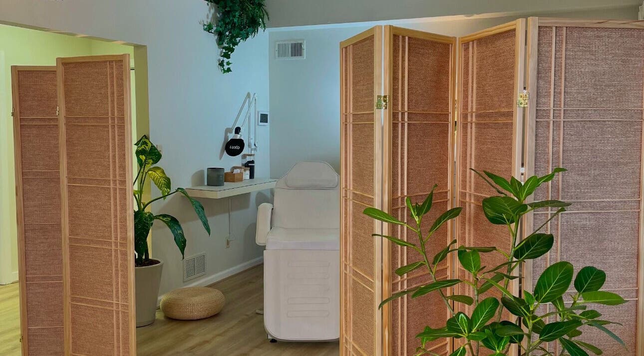 Relaxing spa room at The Skin Tune, Ramsey, New Jersey, US, featuring a treatment chair and calming decor.