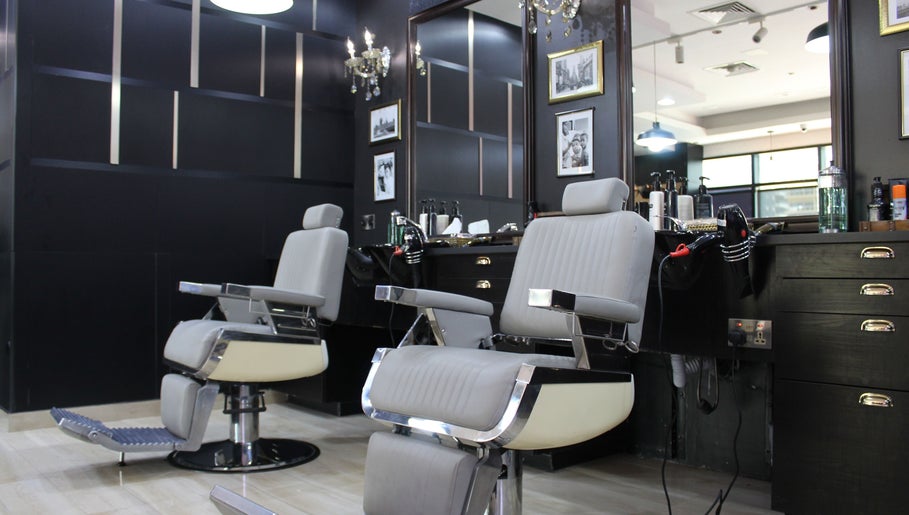 Modern barber chairs at James Pro Barbers, Dubai, Dubai, AE, offering stylish grooming services.