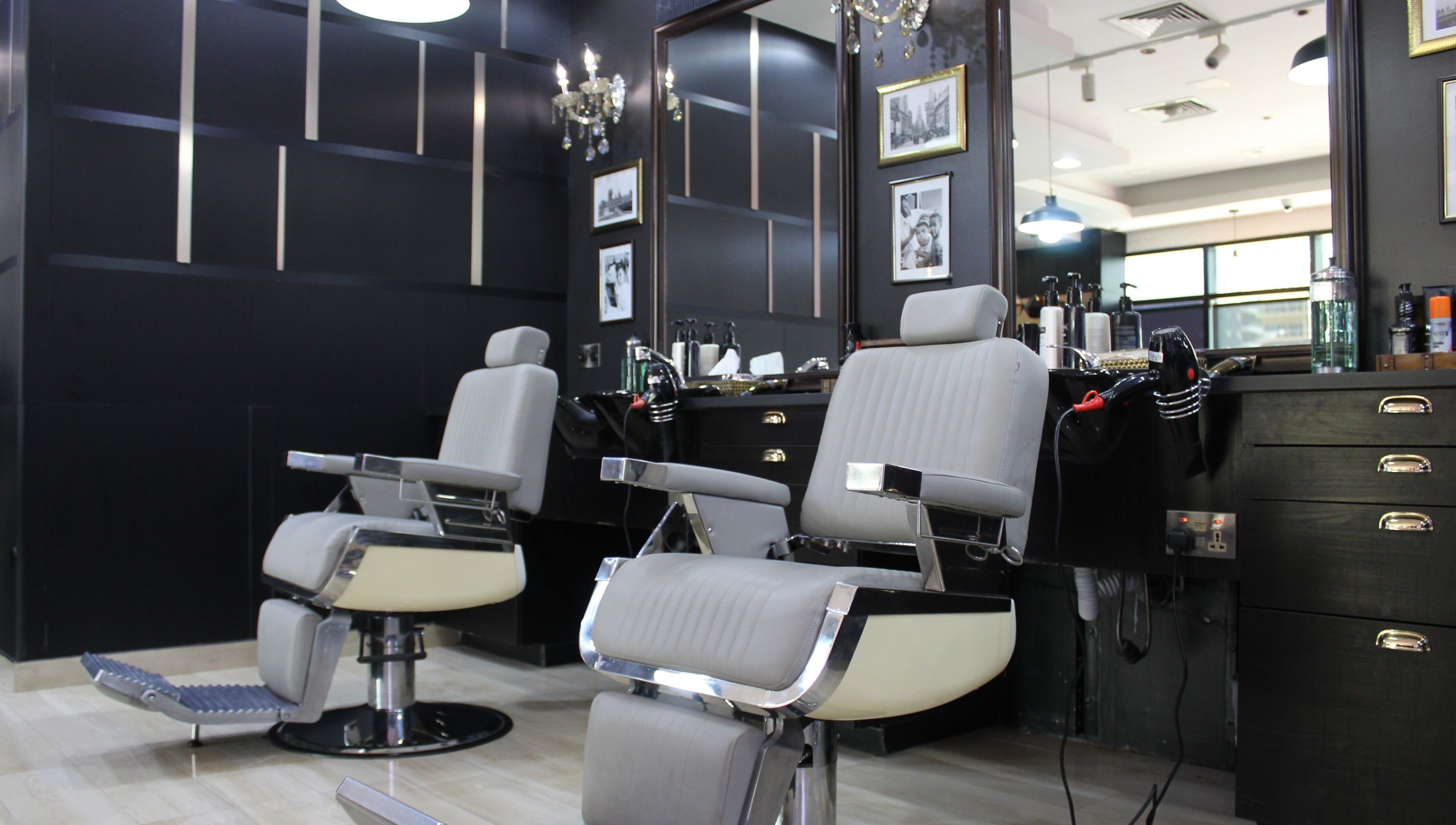 Modern barber chairs at James Pro Barbers, Dubai, Dubai, AE, offering stylish grooming services.