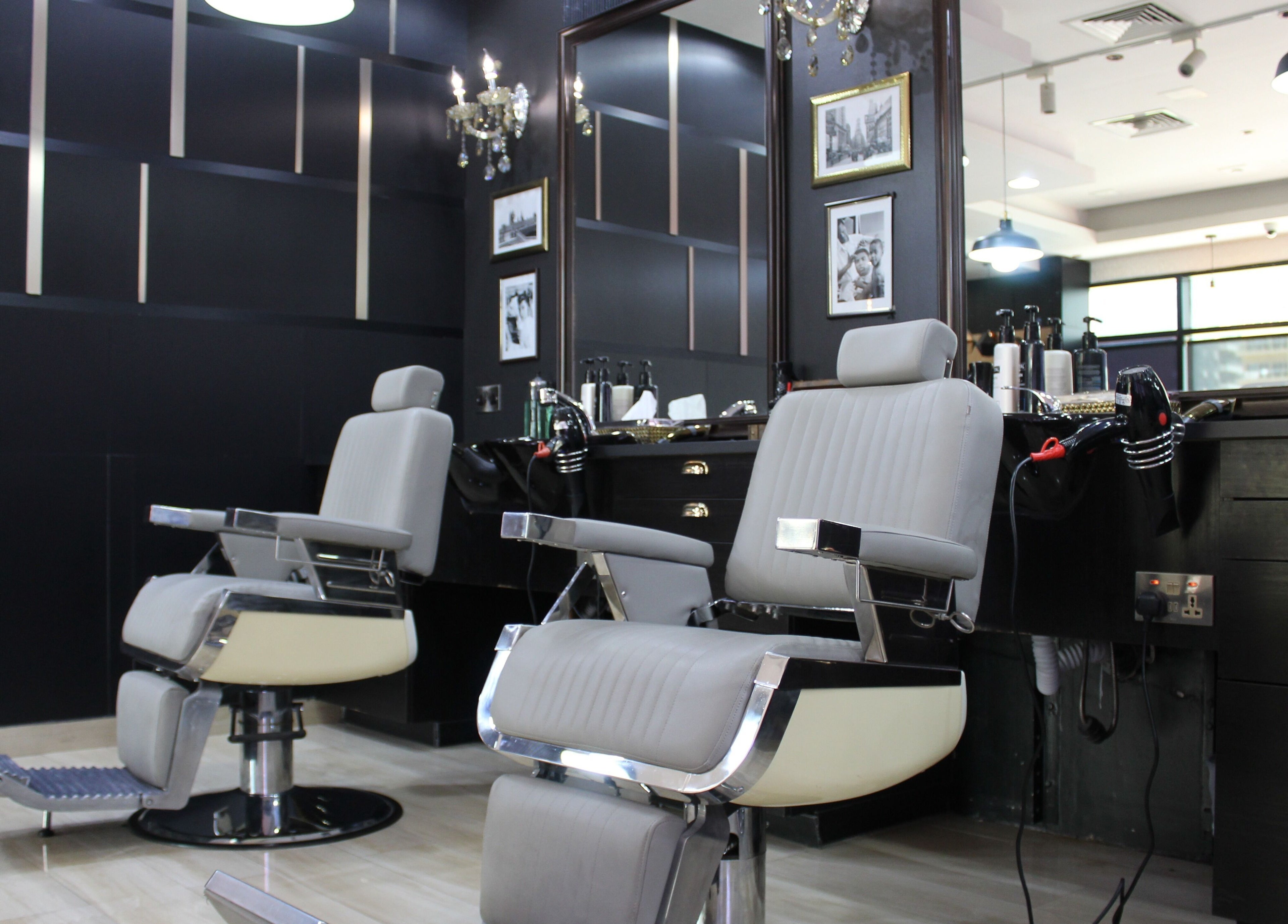 Modern barber chairs at James Pro Barbers, Dubai, Dubai, AE, offering stylish grooming services.