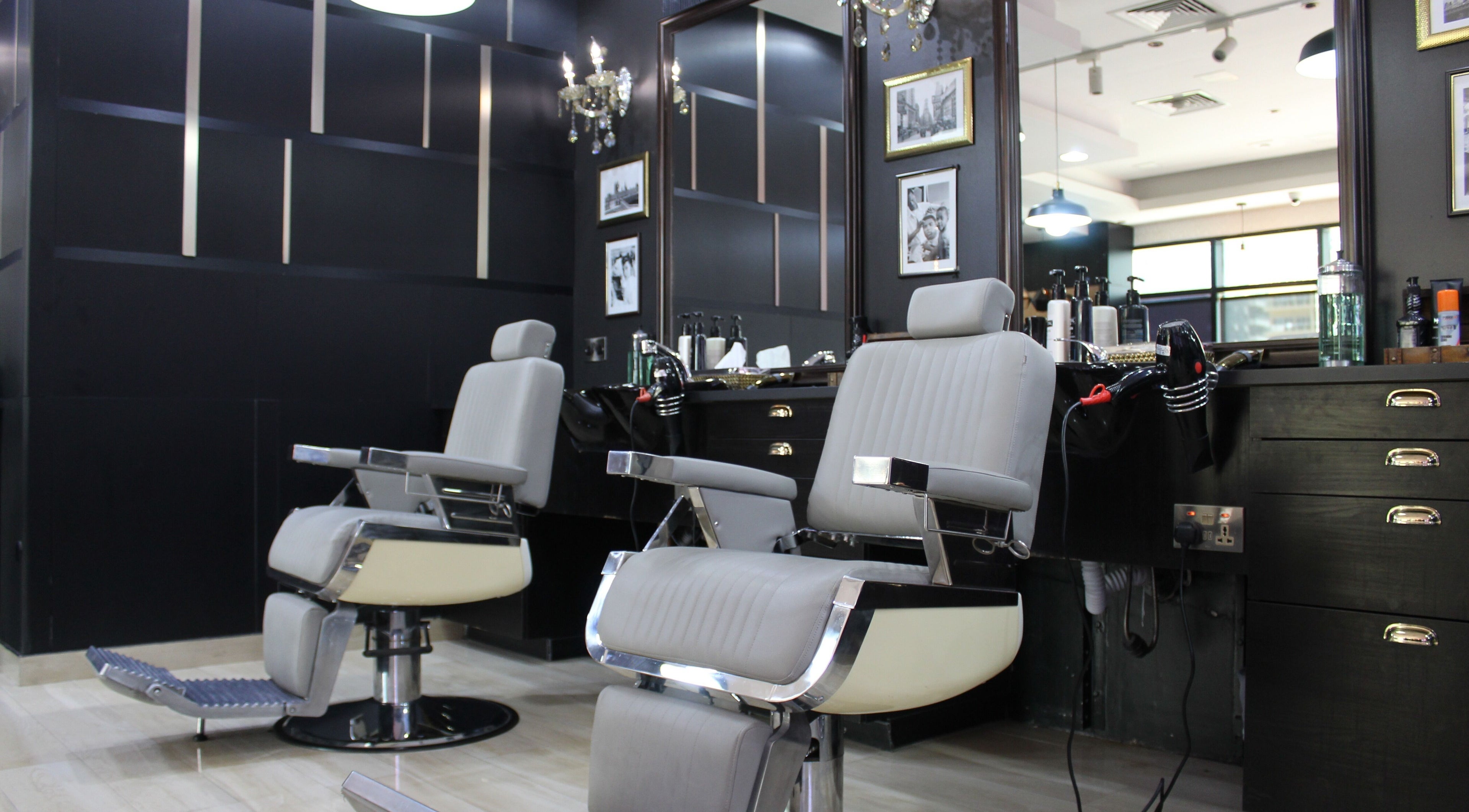 Modern barber chairs at James Pro Barbers, Dubai, Dubai, AE, offering stylish grooming services.