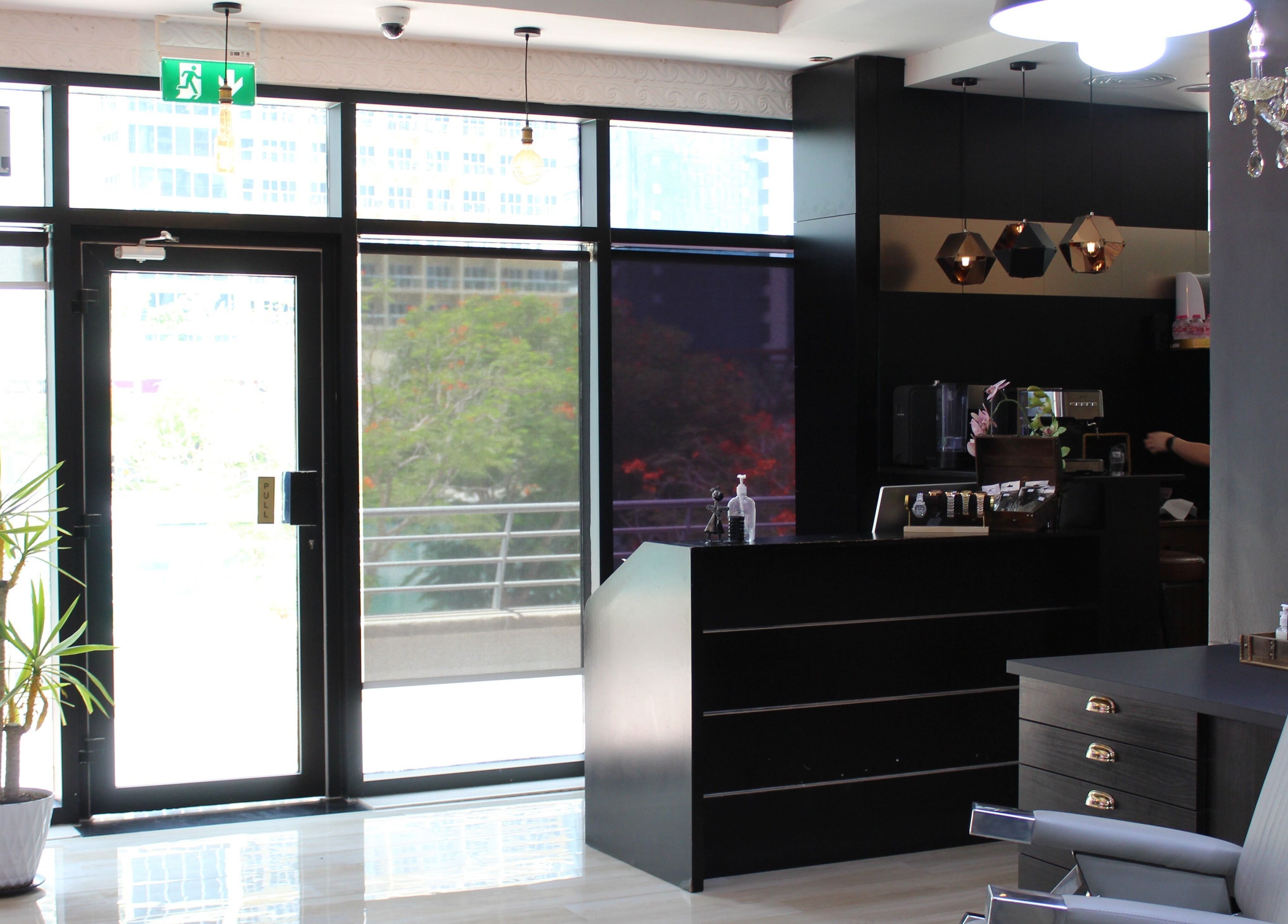 Interior of James Pro Barbers in Dubai, Dubai, AE, showcasing sleek design and modern styling chair.