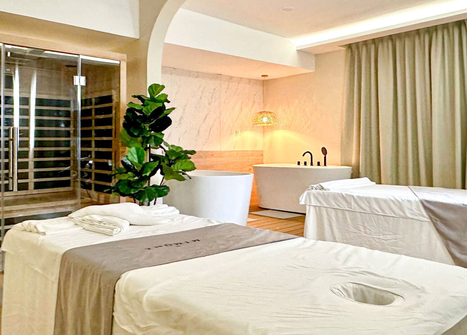 Luxurious MIMONE Spa TTDI massage room in Kuala Lumpur, Wilayah Persekutuan Kuala Lumpur, MY with elegant decor.