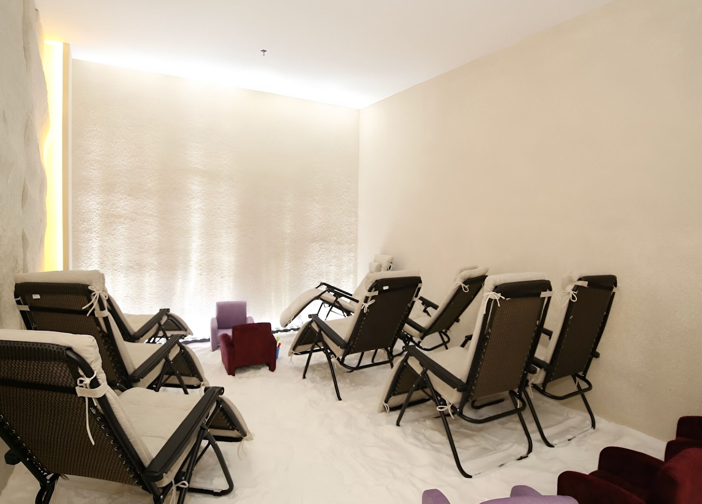 Relaxing lounge area at MIMONE Spa Trion at KL, Kuala Lumpur, with comfortable seating for calm retreats.