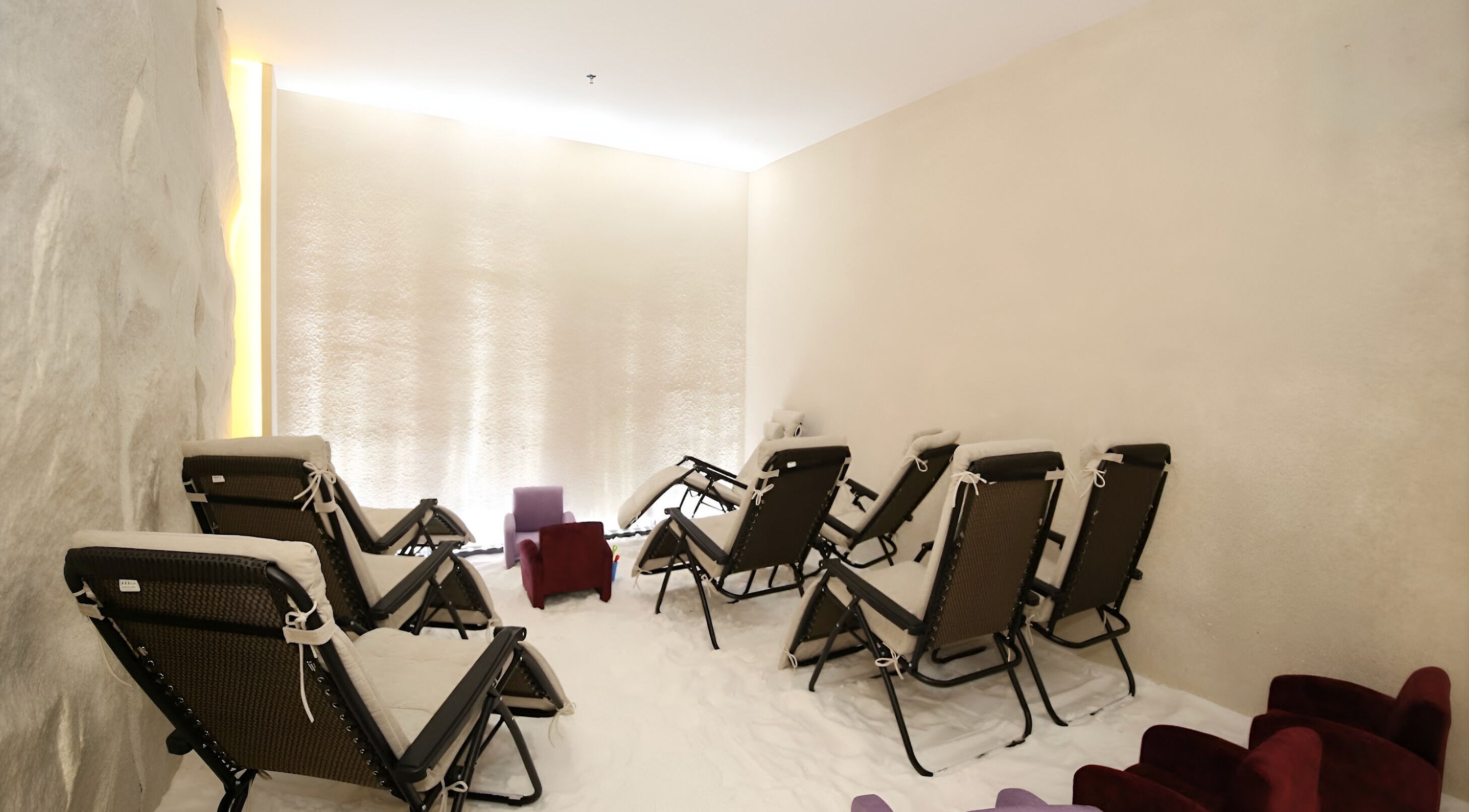 Relaxing lounge area at MIMONE Spa Trion at KL, Kuala Lumpur, with comfortable seating for calm retreats.