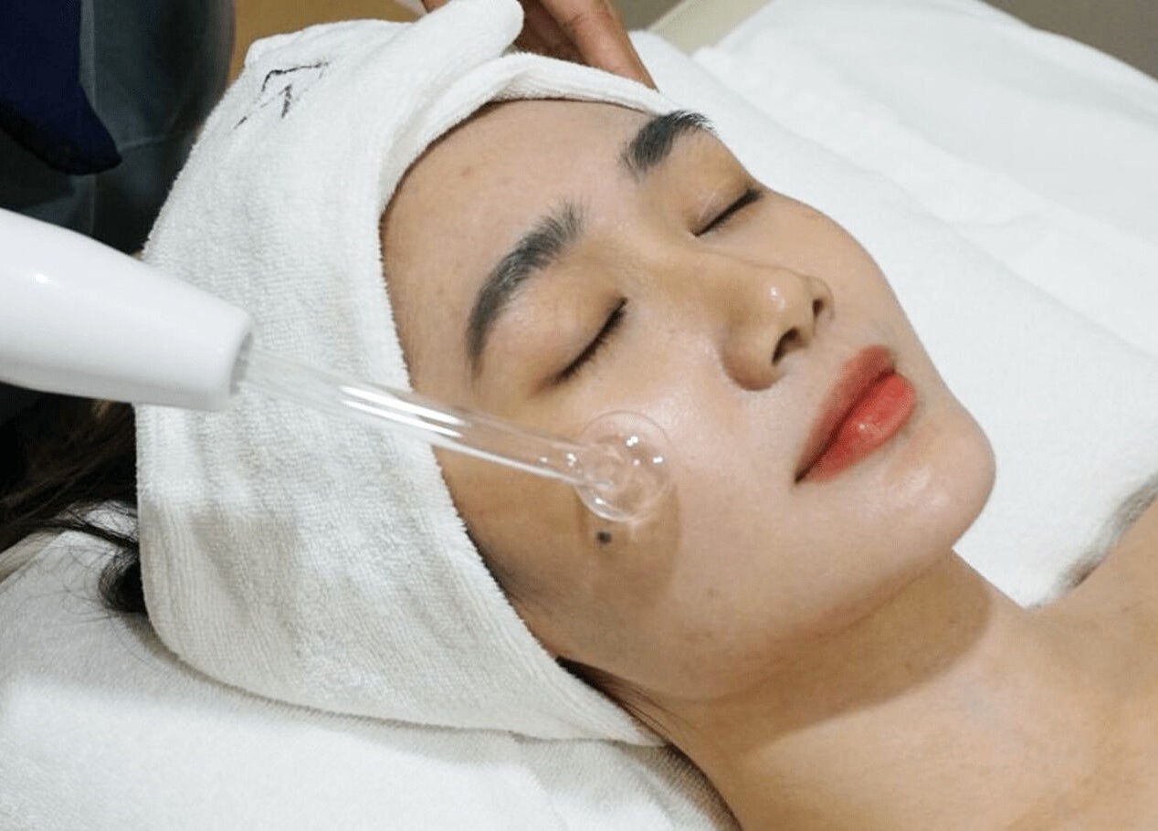 Facial treatment at MIMONE Spa Trion at KL, Kuala Lumpur, MY, enhancing skin's radiance.
