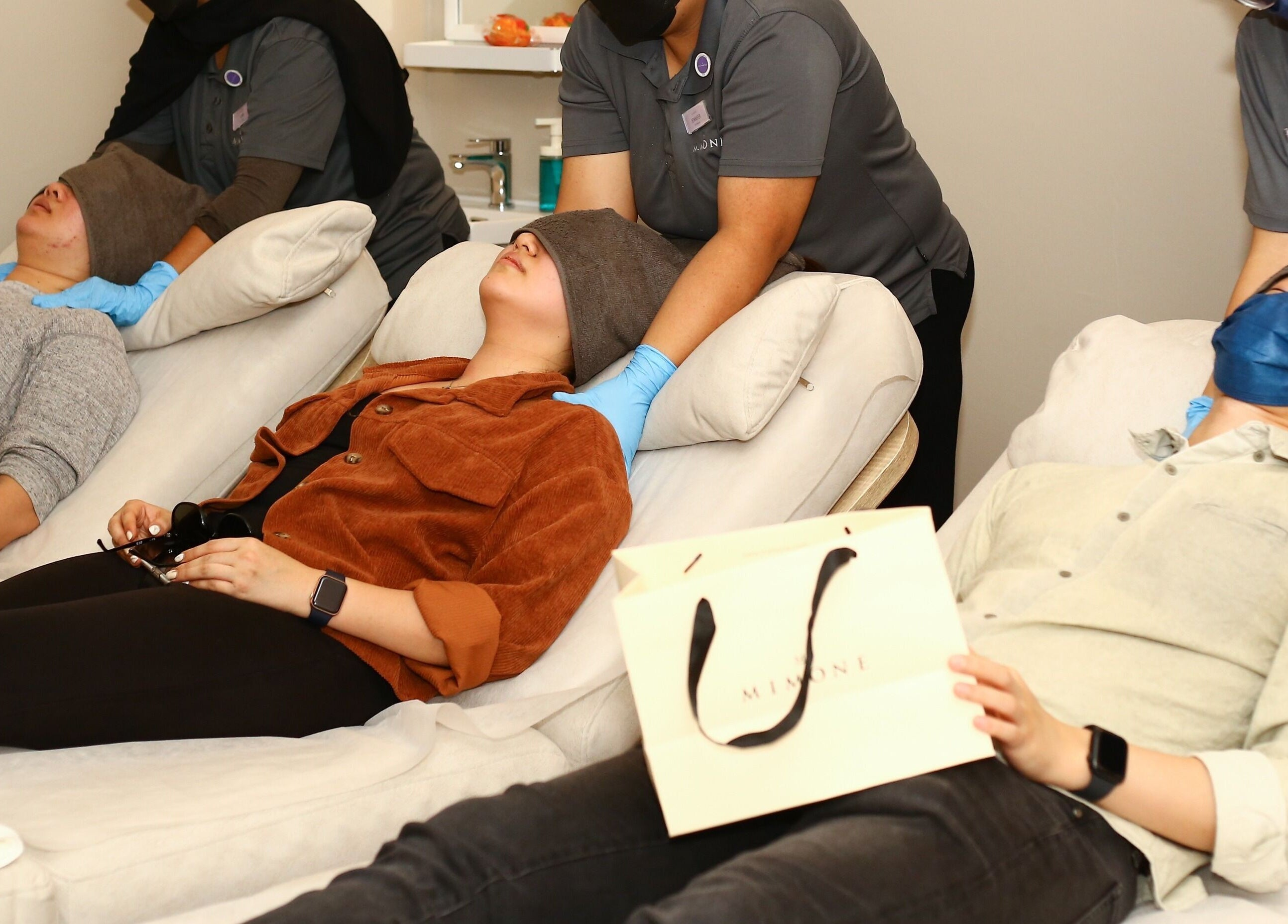 Clients enjoying a relaxing neck massage at MIMONE Spa Trion at KL, Kuala Lumpur, Wilayah Persekutuan Kuala Lumpur, MY.