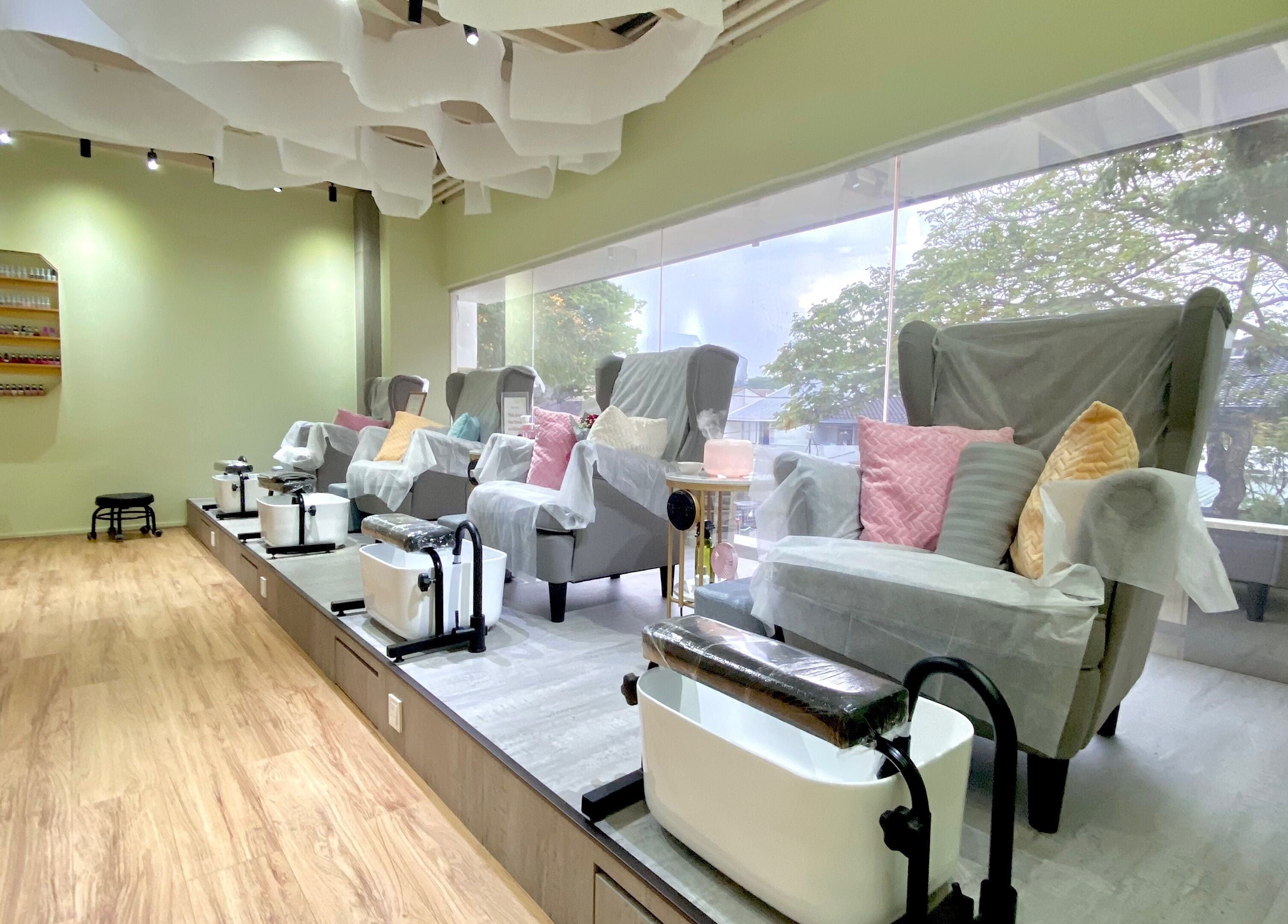 Luxurious pedicure chairs at MIMONE Spa Bangsar, Kuala Lumpur, MY, offering serene comfort and ambiance.