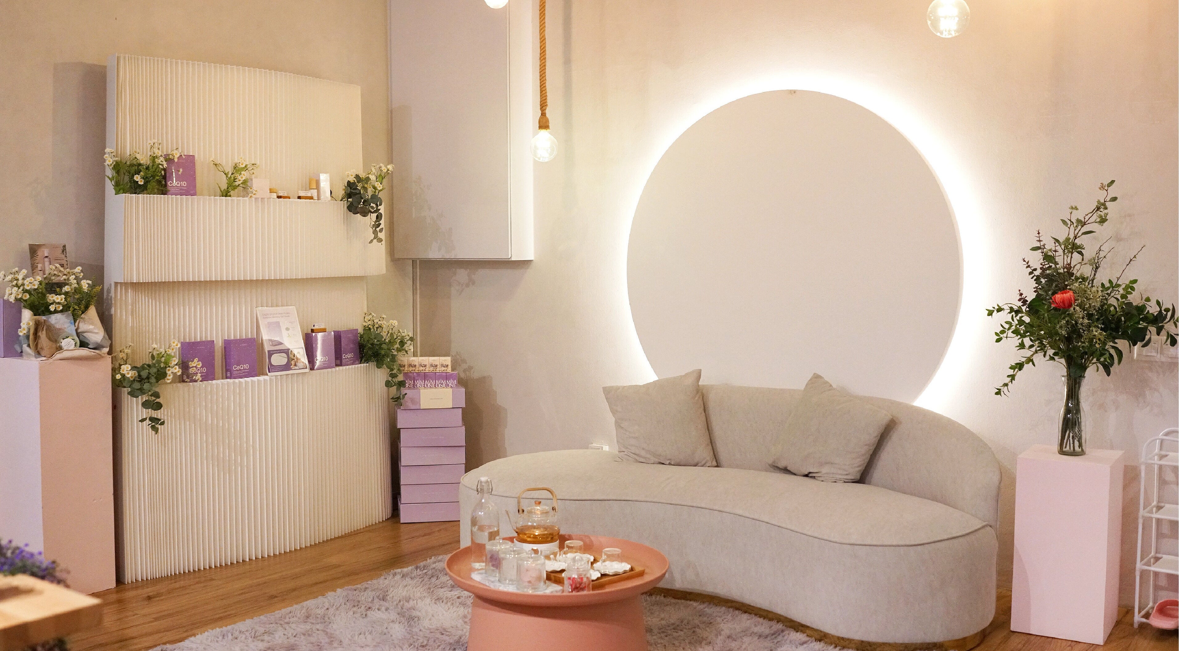 A serene lounge at MIMONE Spa Bangsar, Kuala Lumpur, featuring plush seating with elegant decor.